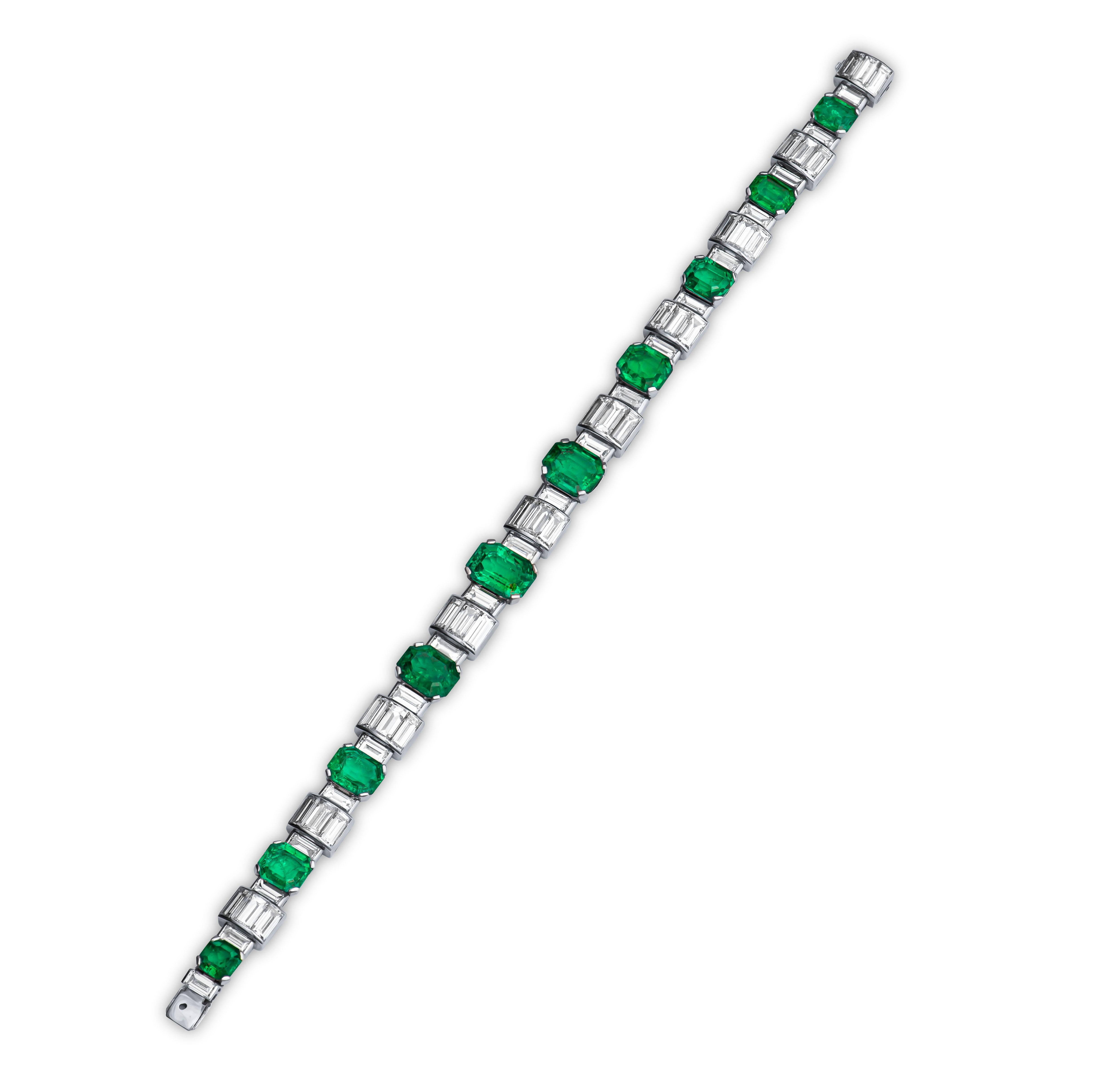 Exceptionally beautiful one-of-a-kind handmade vintage emerald and diamond bracelet that showcases 13.42 carats total of fine, richly saturated and clean natural Colombian emeralds with approximately 18.75 carats total of Collection Quality baguette