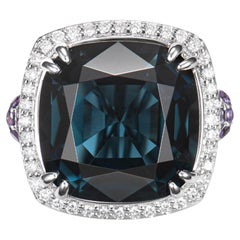 13.44 Carat London Blue Topaz Cocktail Ring in 18KWG with Amethyst and Diamond.