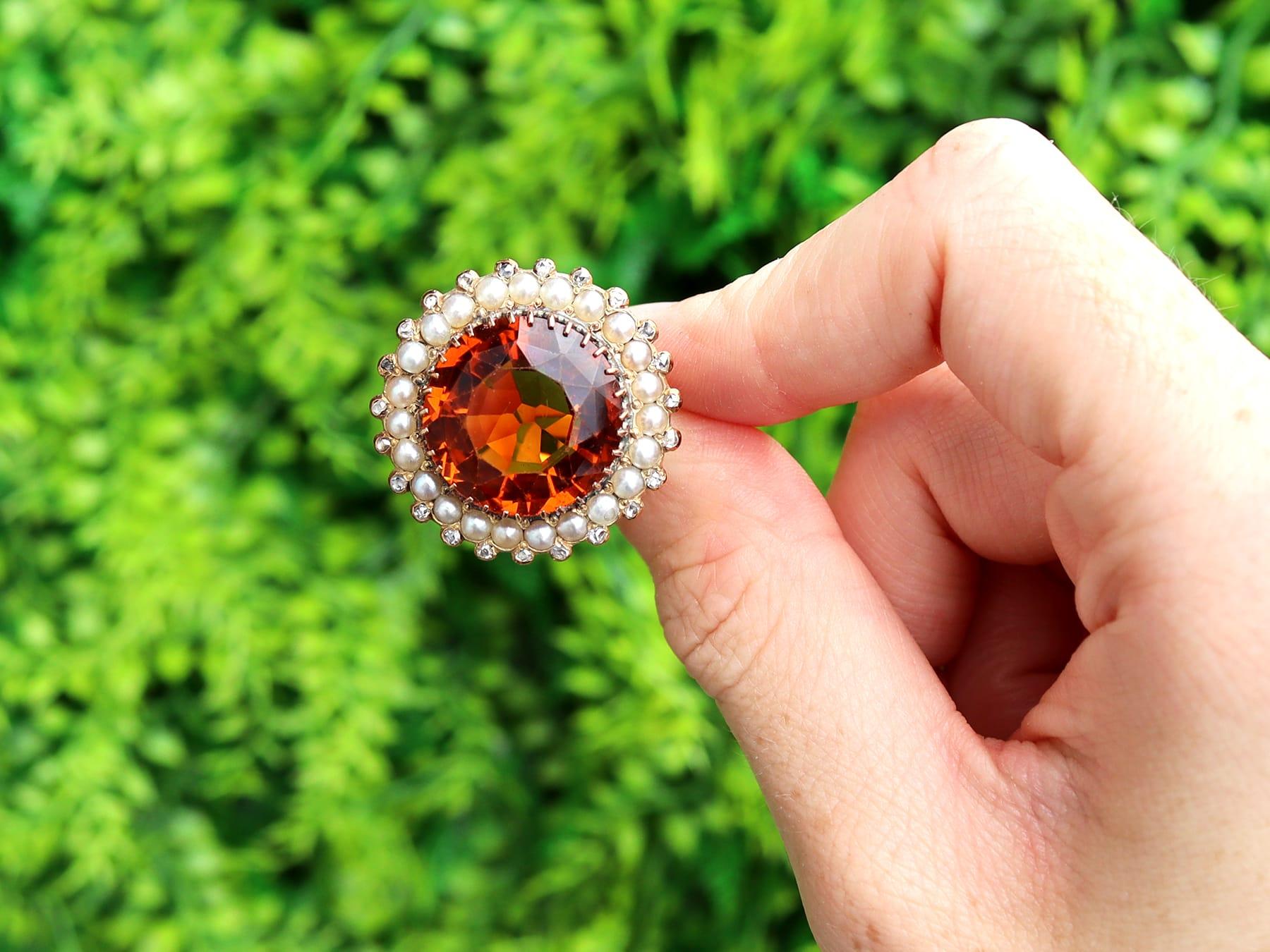 A stunning vintage Dutch 13.46 carat citrine and 0.29 carat diamond, seed pearl and 14 karat yellow gold cocktail ring; part of our diverse gemstone jewelry collections.

This stunning, fine and impressive vintage ring has been crafted in 14k yellow
