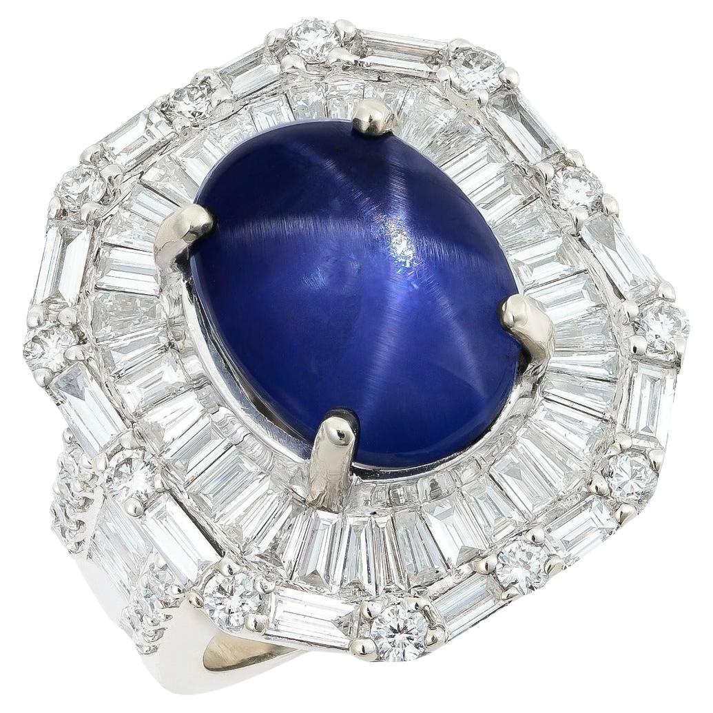 13.46 cts Natural Violetish Blue Star Sapphire 
2.71 cts Diamonds 18K WG Ring