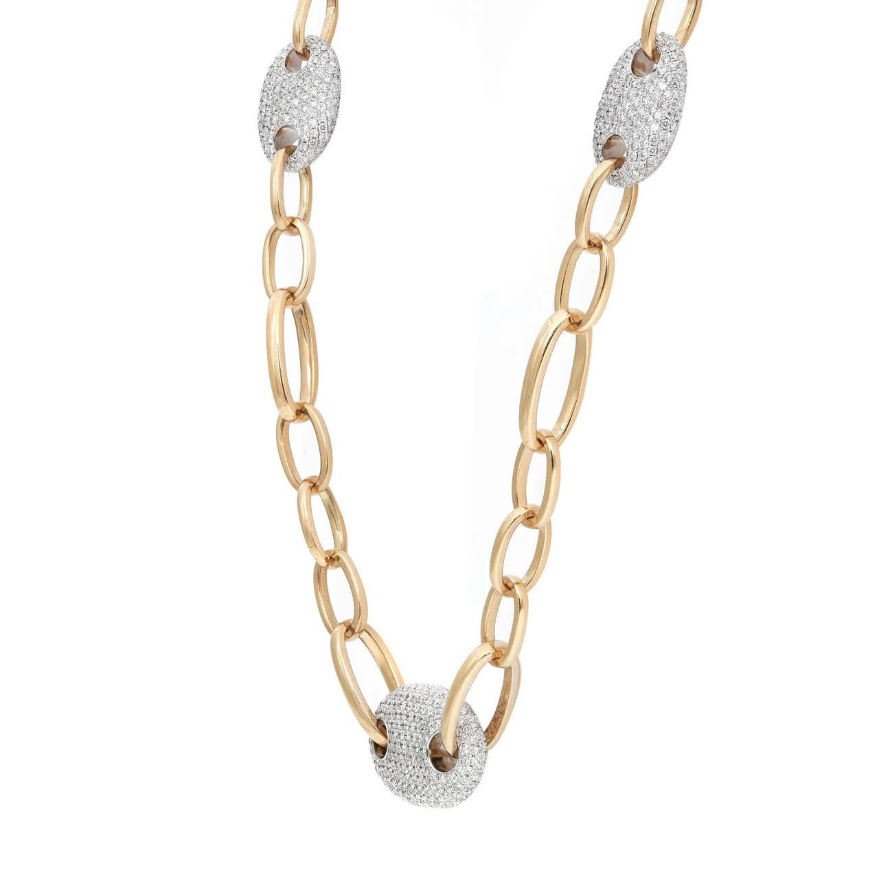 Step into a world of glamour with our 13.47 Carat Diamond Mariner Link Chain Necklace in stunning 18K Yellow Gold. This show-stopping piece is a dazzling symphony of luxury, featuring meticulously crafted mariner links adorned with a breathtaking