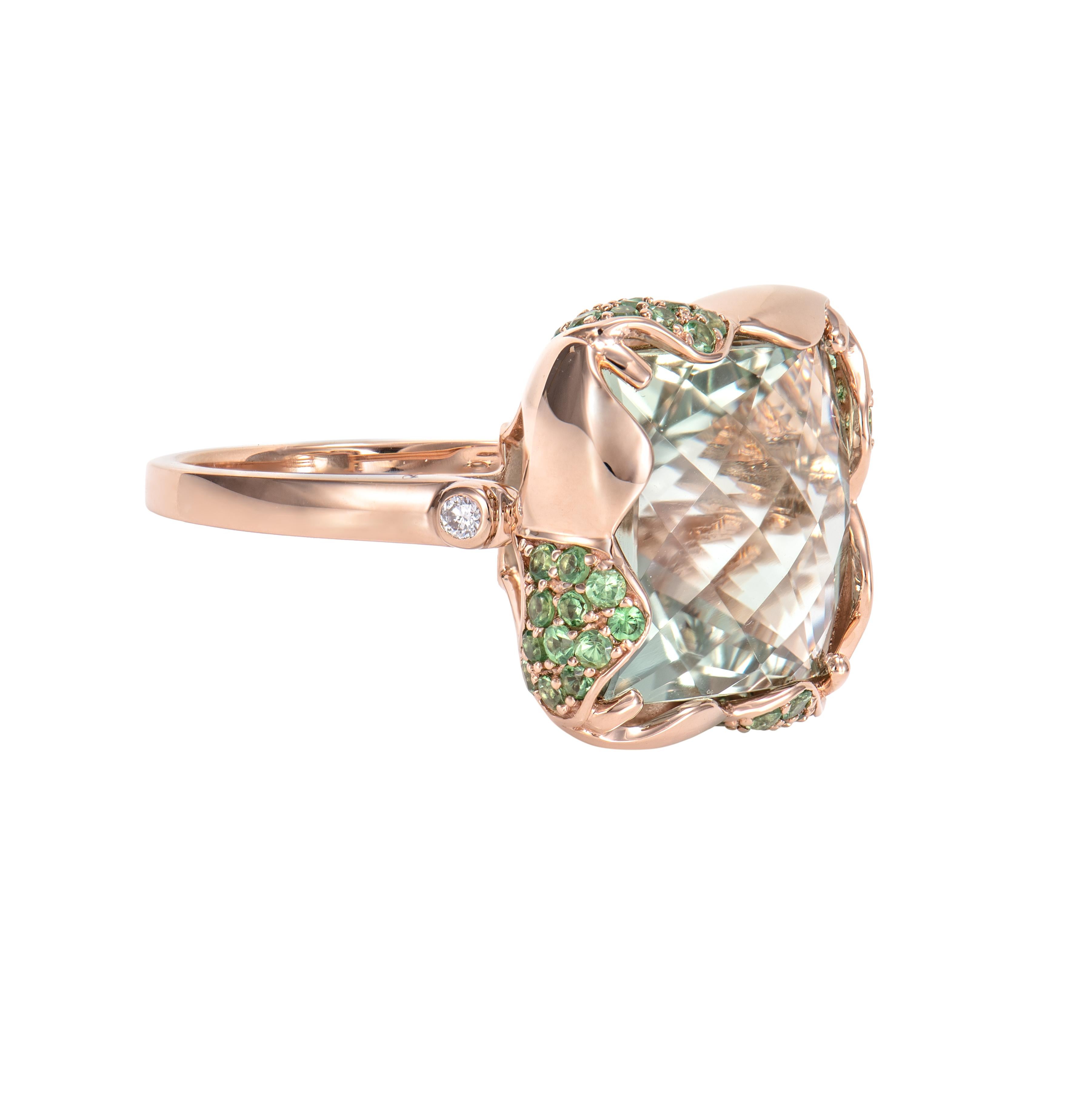 It's a fancy Mint Quartz Ring in a Square shape with checkerboard cut with Mint hue. The Ring are elegant and can be worn for many occasions. The Tsavorite stone around the ring add to the beauty and elegance of the ring. These beautiful gems make