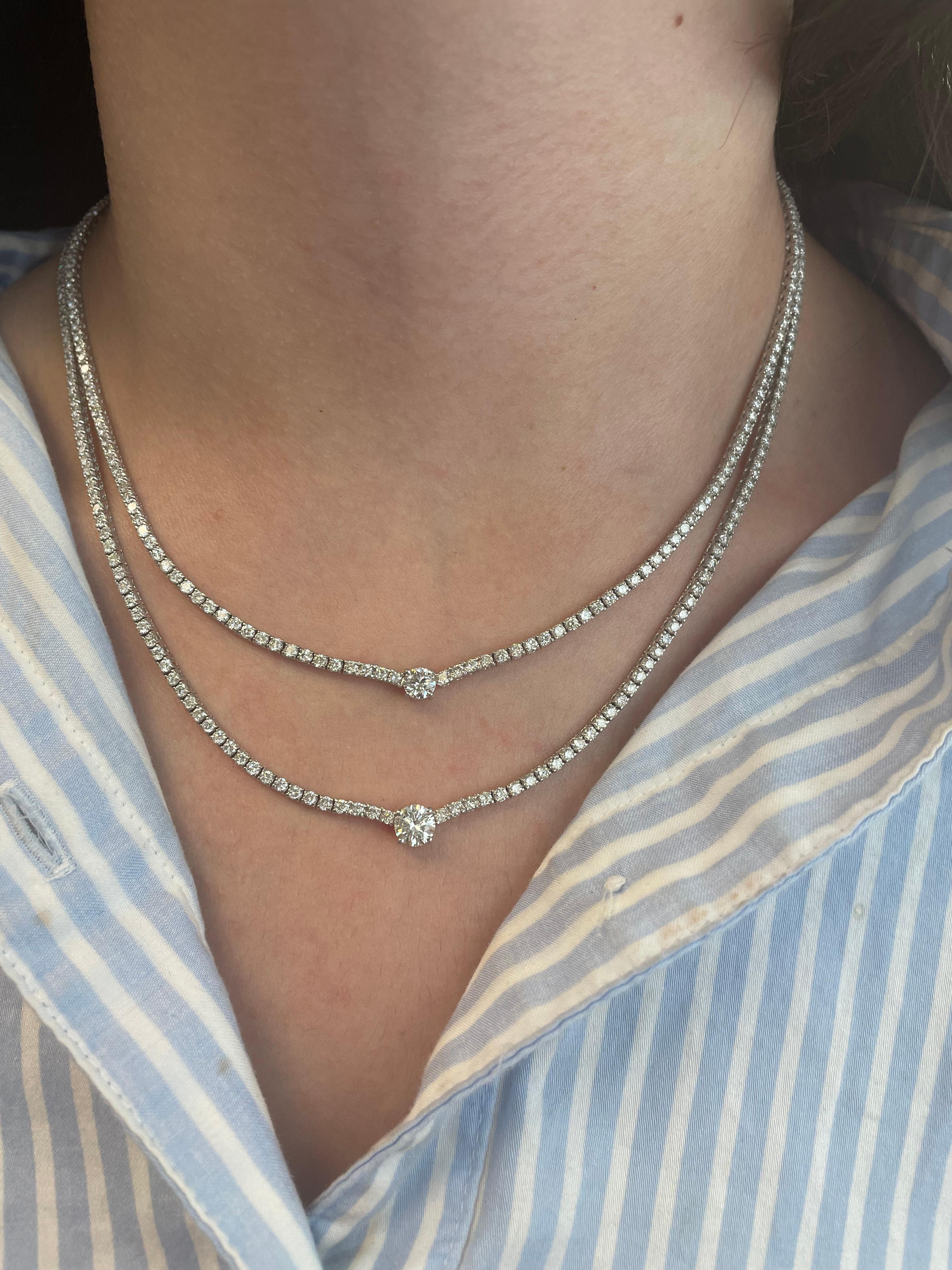 Exquisite double diamond tennis necklace with center diamond. High jewelry by Alexander Beverly Hills.
Top center round brilliant diamonds 0.47ct and bottom center diamond 0.84ct. Both approximately G/H color and VS clarity. Complimented with 12.17