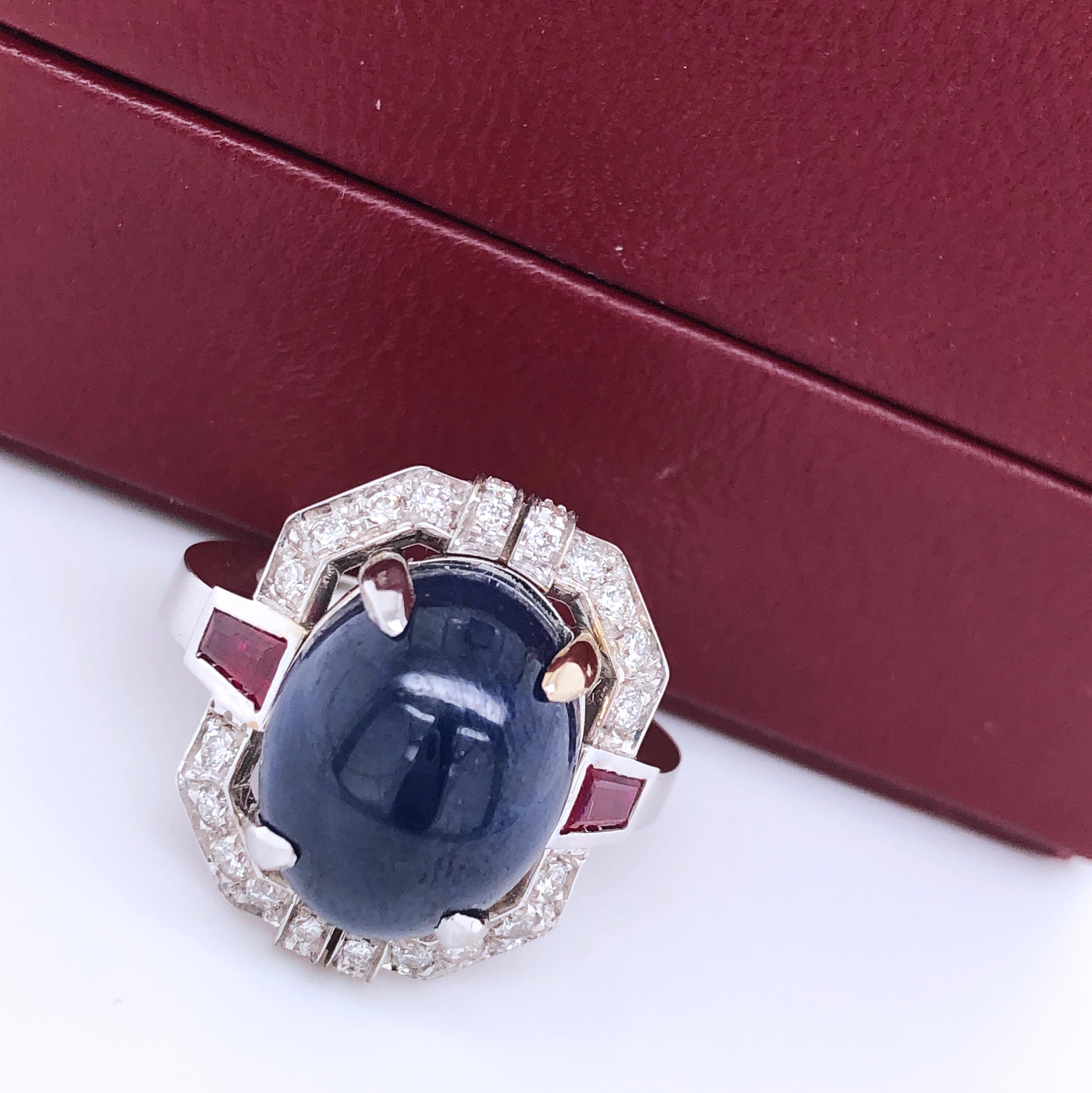 Oval Cut Berca 13.48Kt Oval Sapphire Cabochon 0.42Kt Diamond 0.66Kt Ruby Cocktail Ring
