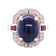 Berca 13.48Kt Oval Sapphire Cabochon 0.42Kt Diamond 0.66Kt Ruby Cocktail Ring