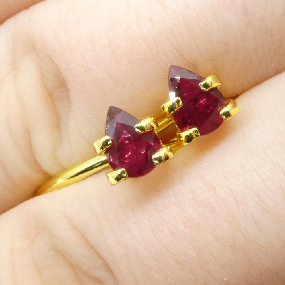Description:

Gem Type: Ruby 
Number of Stones: 2
Weight: 1.34 cts
Measurements: 6.82 x 4.80 x 2.68 mm, 6.88 x 4.88 x 2.31 mm
Shape: Pear
Cutting Style Crown: Brilliant Cut
Cutting Style Pavilion: Step Cut 
Transparency: Transparent
Clarity: Very