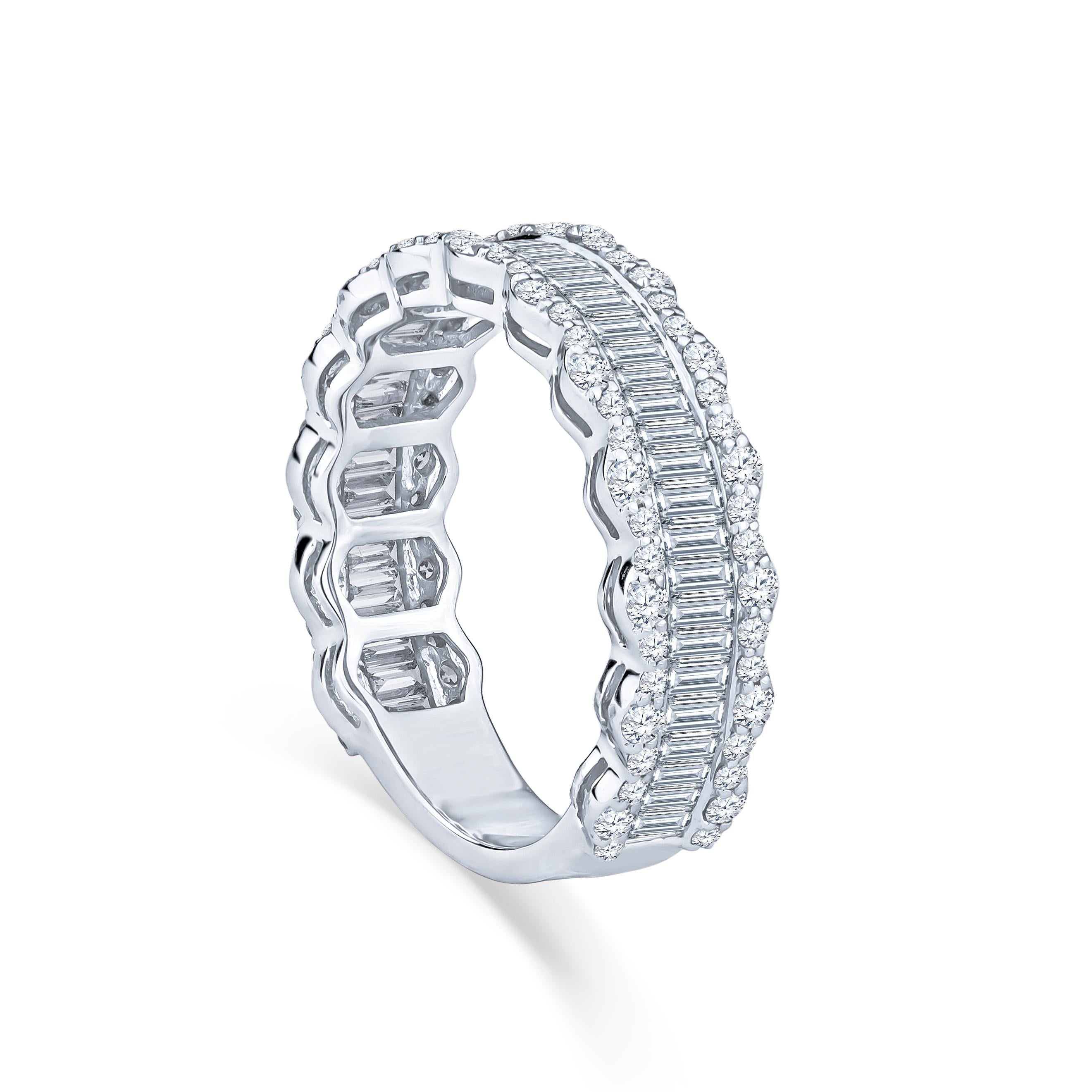 This band has a total weight of 1.34ct in baguette and round diamonds! It is all set in an 18kt white gold ring. The size is a 6.5, but it has some room to be resized.