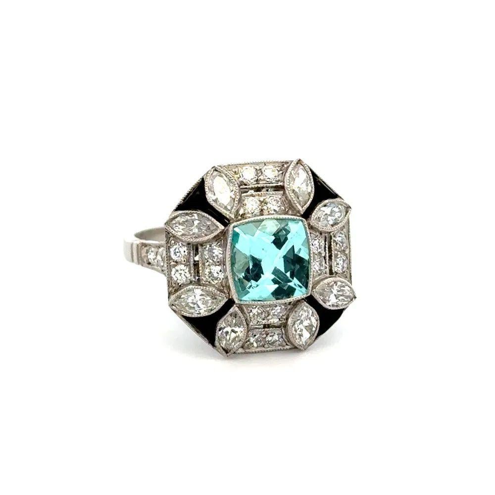 Semplicemente bello! Anello in platino con tormalina Paraiba GIA, onice e diamanti, finemente dettagliato. Al centro una tormalina Paraiba da 1,35 carati incastonata a mano. Circondato da onice, 1,36tcw di diamanti Marquis e Old European Cut.