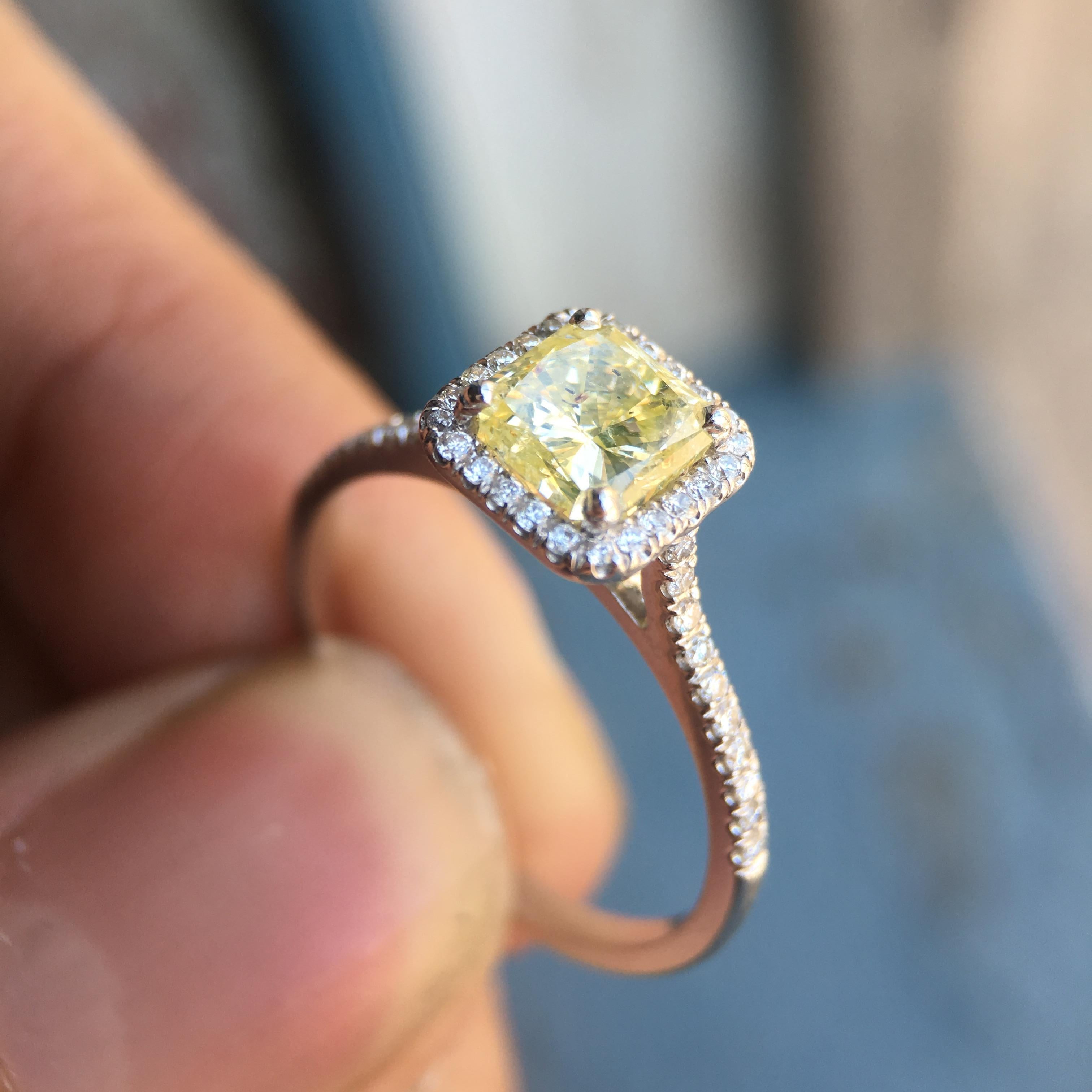 Ring will be made to order to your finger size  takes approximately 3-6 business weeks.

Retail Replacement Appraisal Price - $8,500.00

1.35 Carat Total Weight (Apprx) Diamond and 18k White Gold Engagement Ring 

 Center Stone is a Fancy Yellow