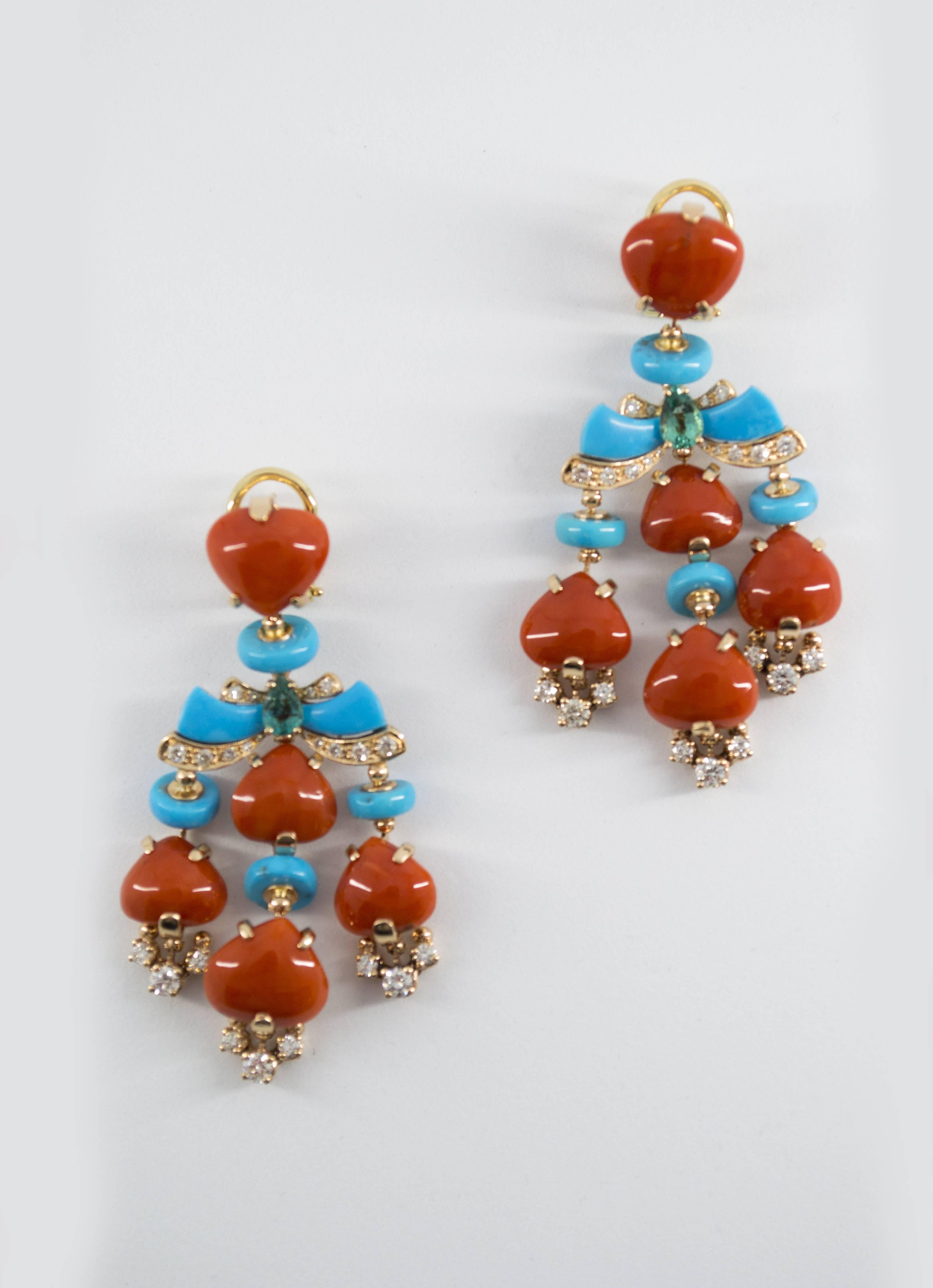 These Earrings are made of 14K Yellow Gold.
These Earrings have 1.35 Carats of Diamonds.
These Earrings have 0.50 Carats of Emeralds.
These Earrings have also Red Mediterranean (Sardinia, Italy) Coral and Turquoise.
All our Earrings have pins for