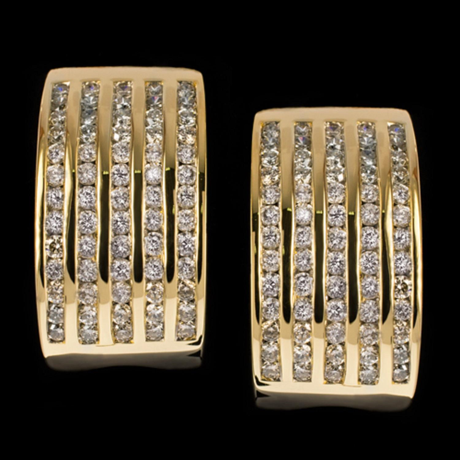 An gorgeous pair of earrings with 1.35ct of sparkling excellent cut diamonds! These yellow gold diamond earrings are sure to impress due to their brilliance, overall size and presence! 

With five rows of sparkling diamonds in each earring, these