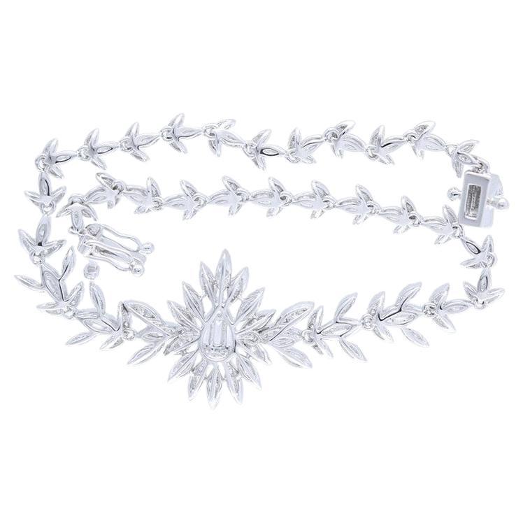 Design: Elegance meets modernity in this exquisite diamond Sequera bracelet, a captivating accessory that seamlessly blends sophistication with contemporary flair. Crafted in radiant 18K white gold, the bracelet showcases a unique design featuring a