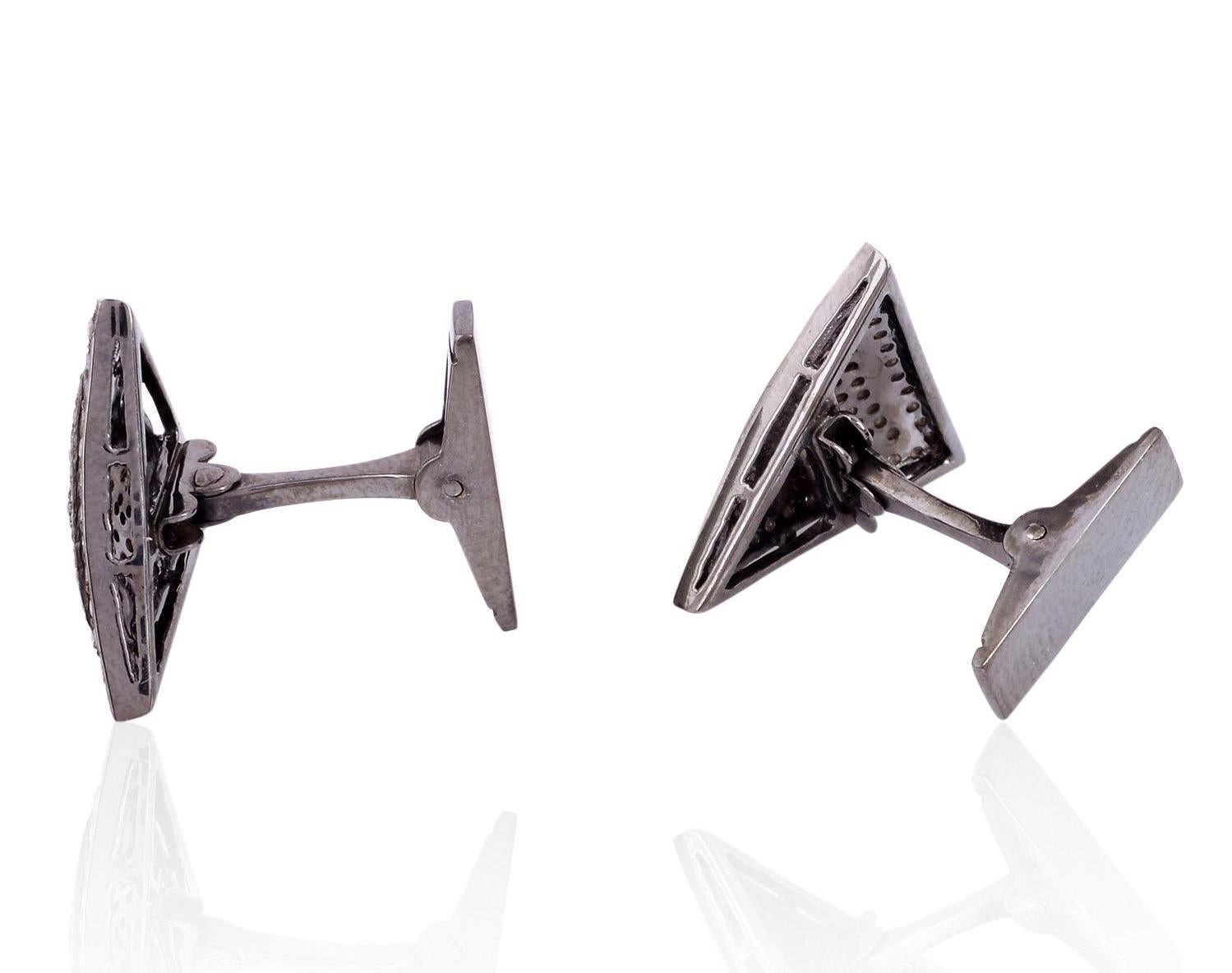 Cast from sterling silver, these triangle cuff links are hand set with 1.35 carats of pave diamonds in blackened finish.

FOLLOW  MEGHNA JEWELS storefront to view the latest collection & exclusive pieces.  Meghna Jewels is proudly rated as a Top