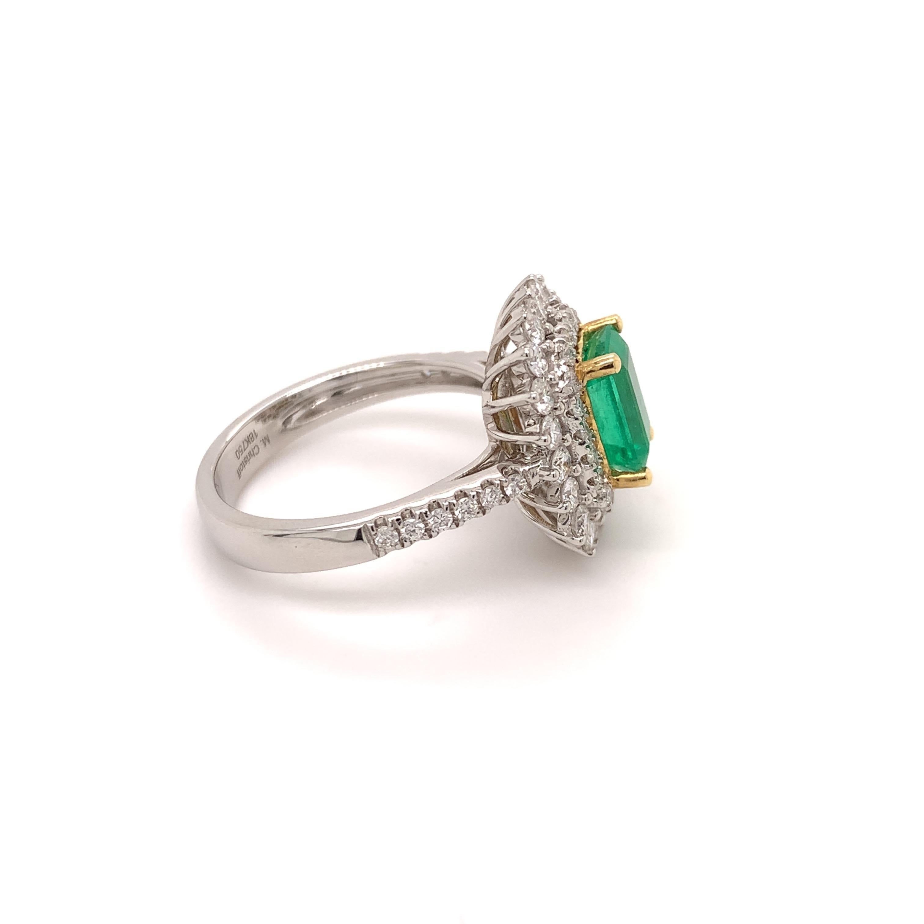 Stunning emerald diamond ring. Lively green tone, high brilliance, emerald faceted 1.35 carats natural emerald encased in high profile mount with four bead prongs, accented with two rows of round brilliant cut diamonds. 
The handcrafted design is