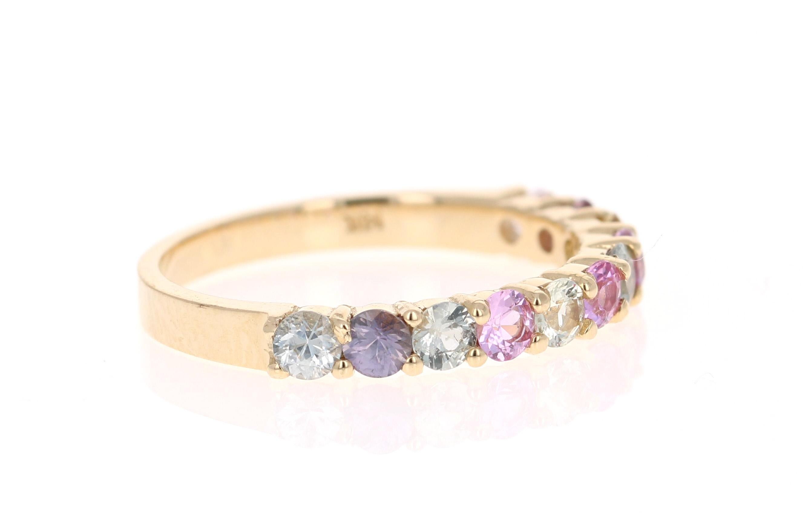 There are 11 Multicolored Natural Sapphires in this band that weigh 1.35 Carats.  It is made in 14K Yellow Gold and weighs approximately 2.0 Grams.

The band is a size 7 and can be re-sized at no additional charge.

It is perfect for everyday wear