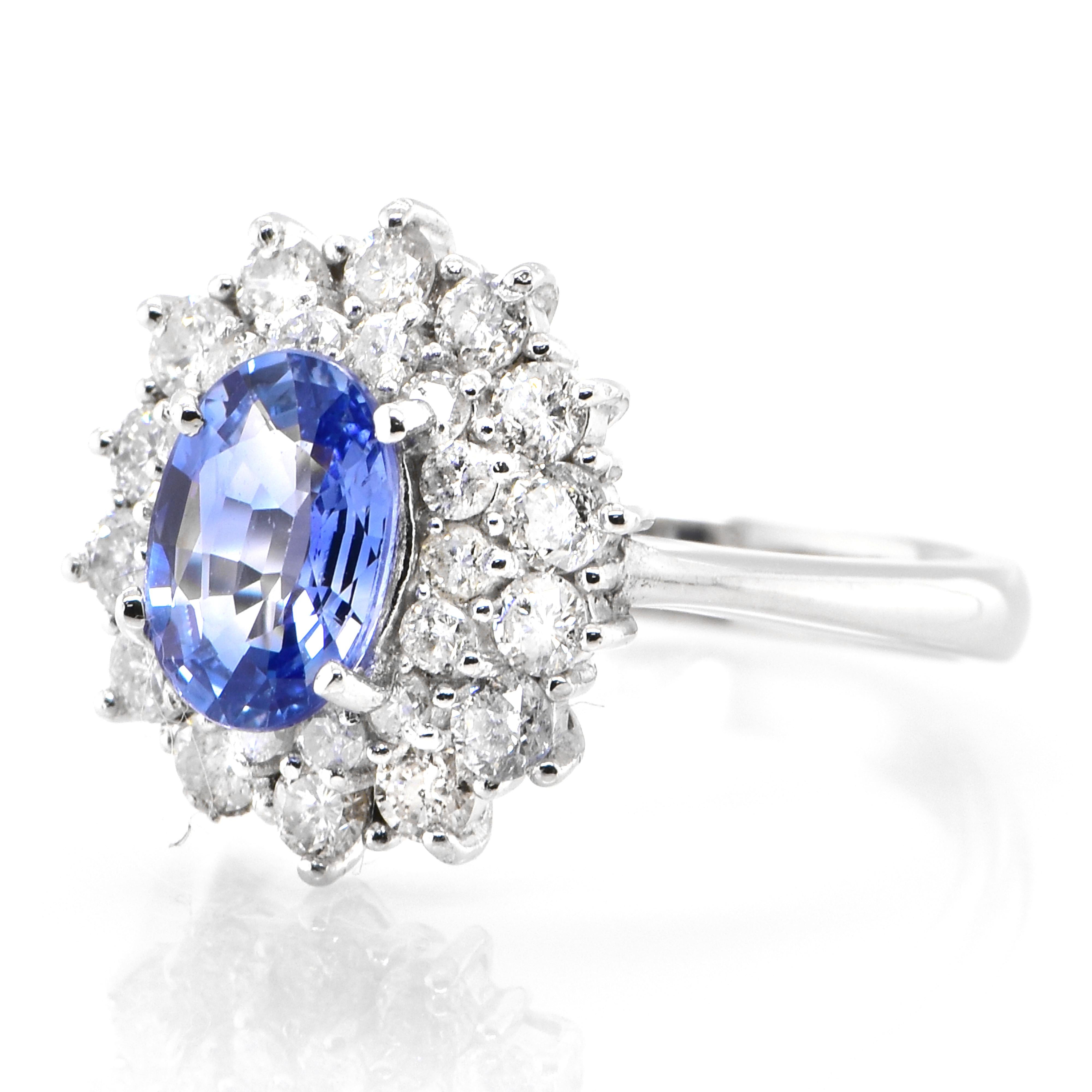 A beautiful ring featuring 1.35 Carat Natural Blue Sapphire and 1.00 Carats Diamond Accents set in Platinum. Sapphires have extraordinary durability - they excel in hardness as well as toughness and durability making them very popular in jewelry.