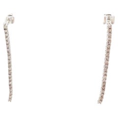 Boucles d
oreilles tennis en or blanc 14 carats et diamant naturel de 1,35 carat