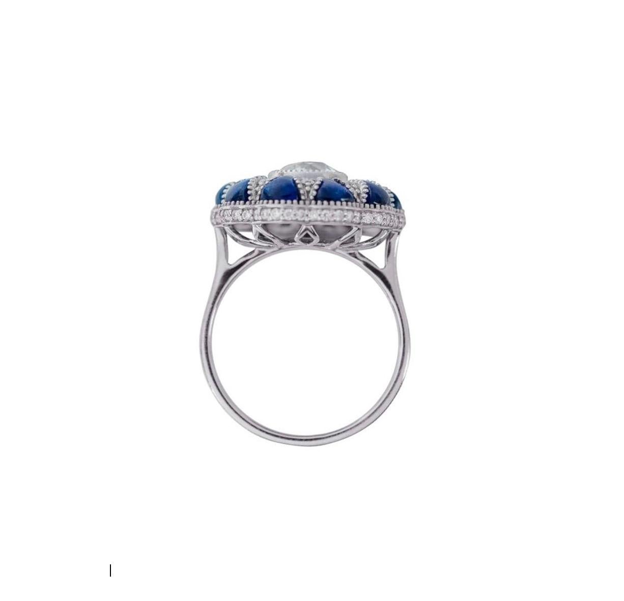 Art Deco 1.35 Carat Old European Cut Diamond with Cabochon Sapphire Ring in 18 Karat Gold For Sale