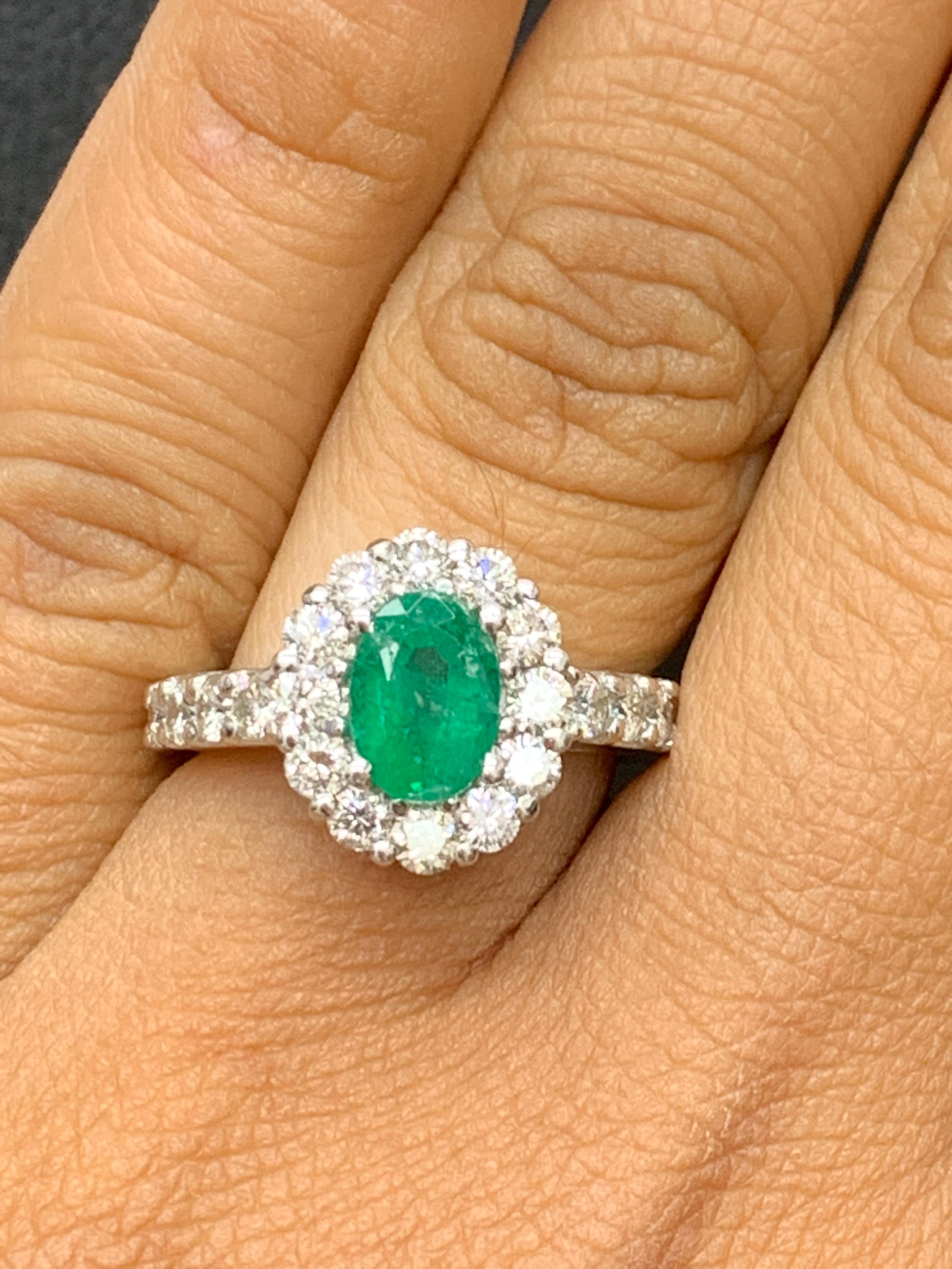 Features a 1.35 carat Oval cut Emerald surrounded by a single row of round brilliant diamonds. Set in a diamond-encrusted band made in 14k white gold. Accent round diamonds weigh 1.01 carats total.

Style available in different price ranges. Prices
