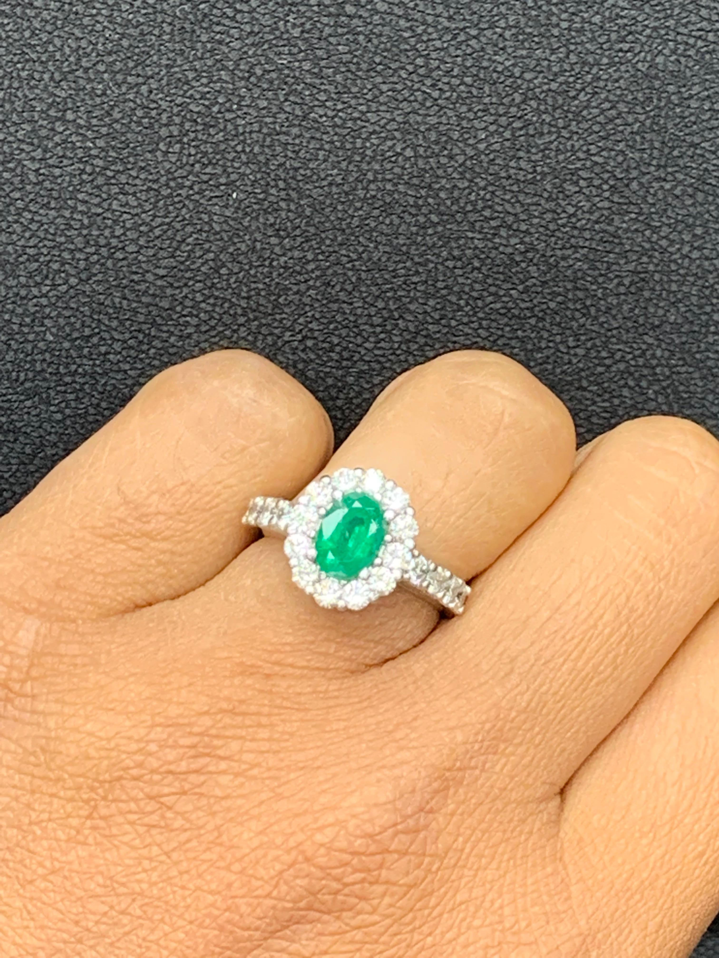 Contemporary 1.35 Carat Oval Cut Emerald and Diamond Engagement Ring in 14K White Gold For Sale