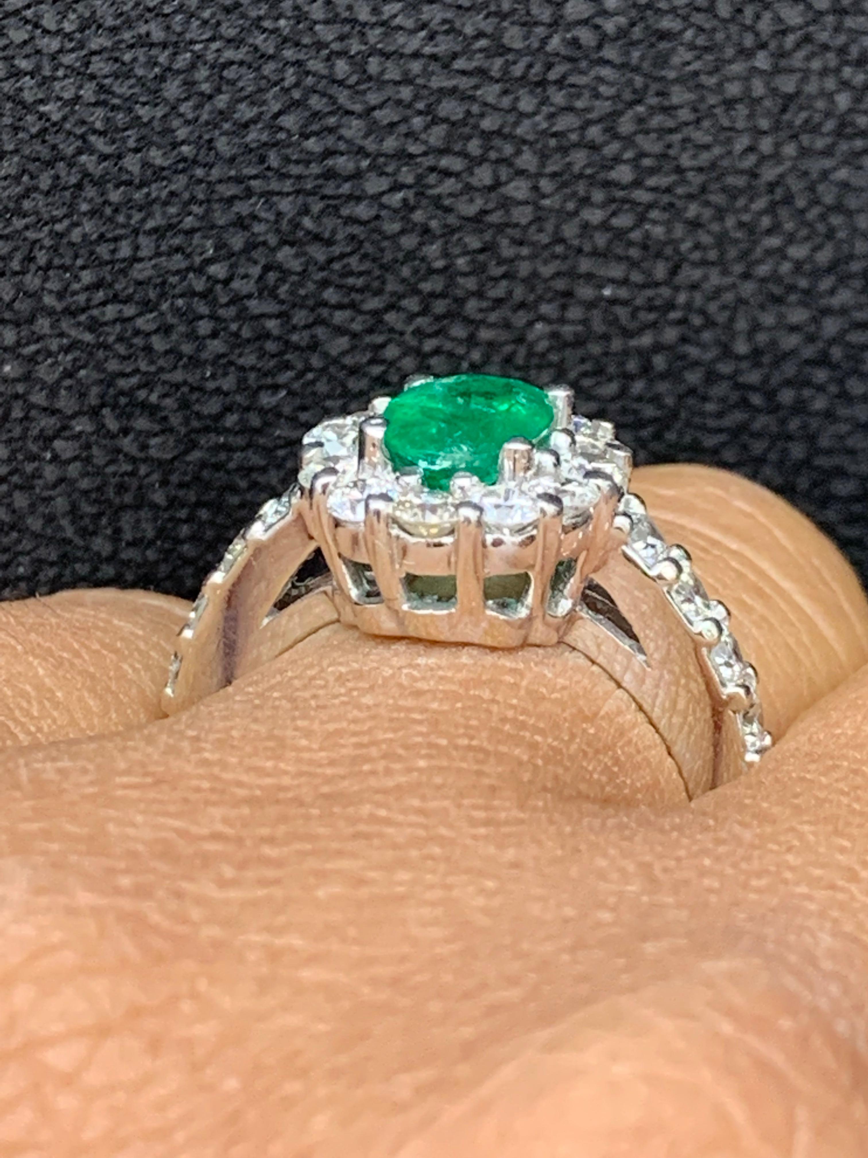 1.35 Carat Oval Cut Emerald and Diamond Engagement Ring in 14K White Gold In New Condition For Sale In NEW YORK, NY