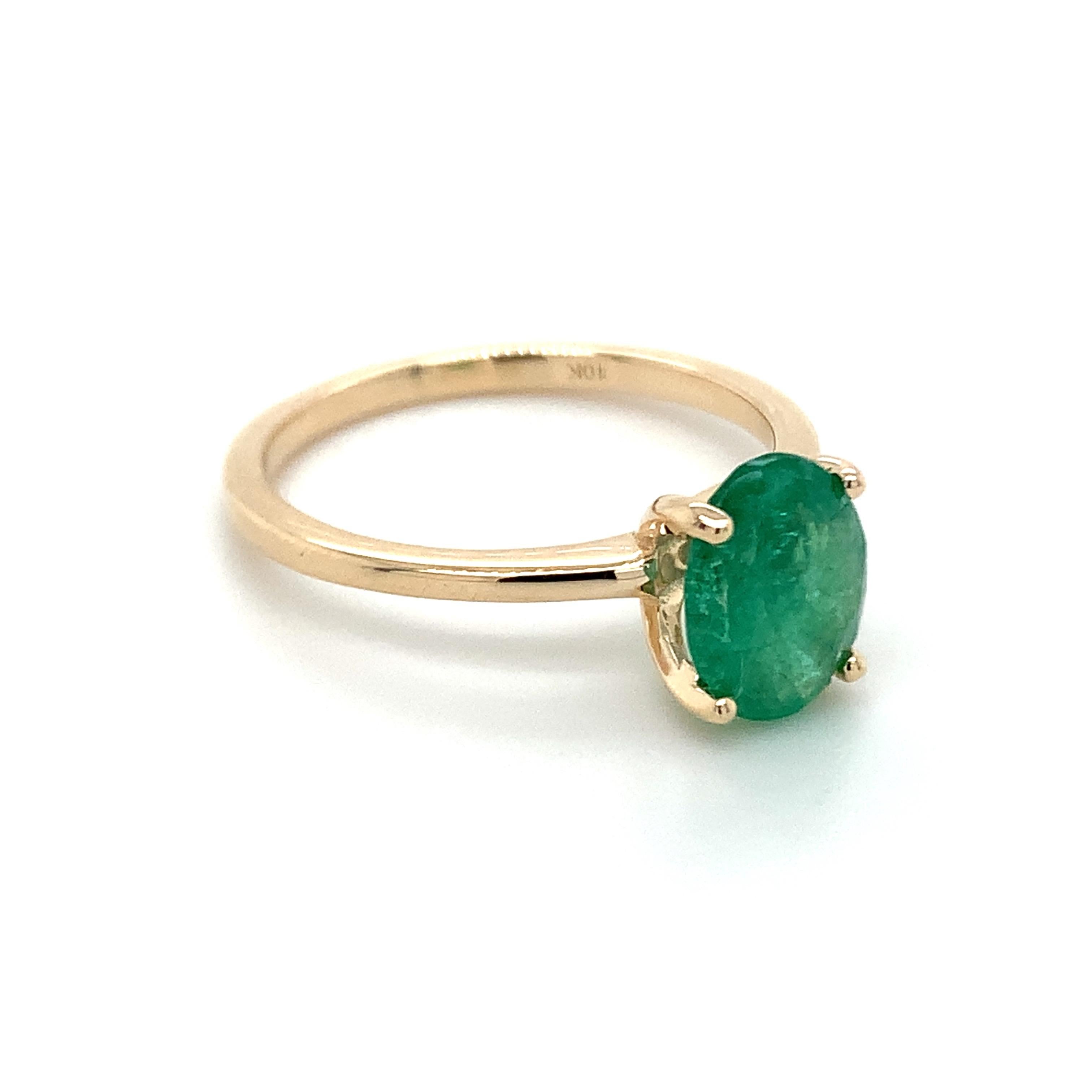 Modern 1.35 Carat Oval Cut Emerald Ring in 10k Yellow Gold For Sale