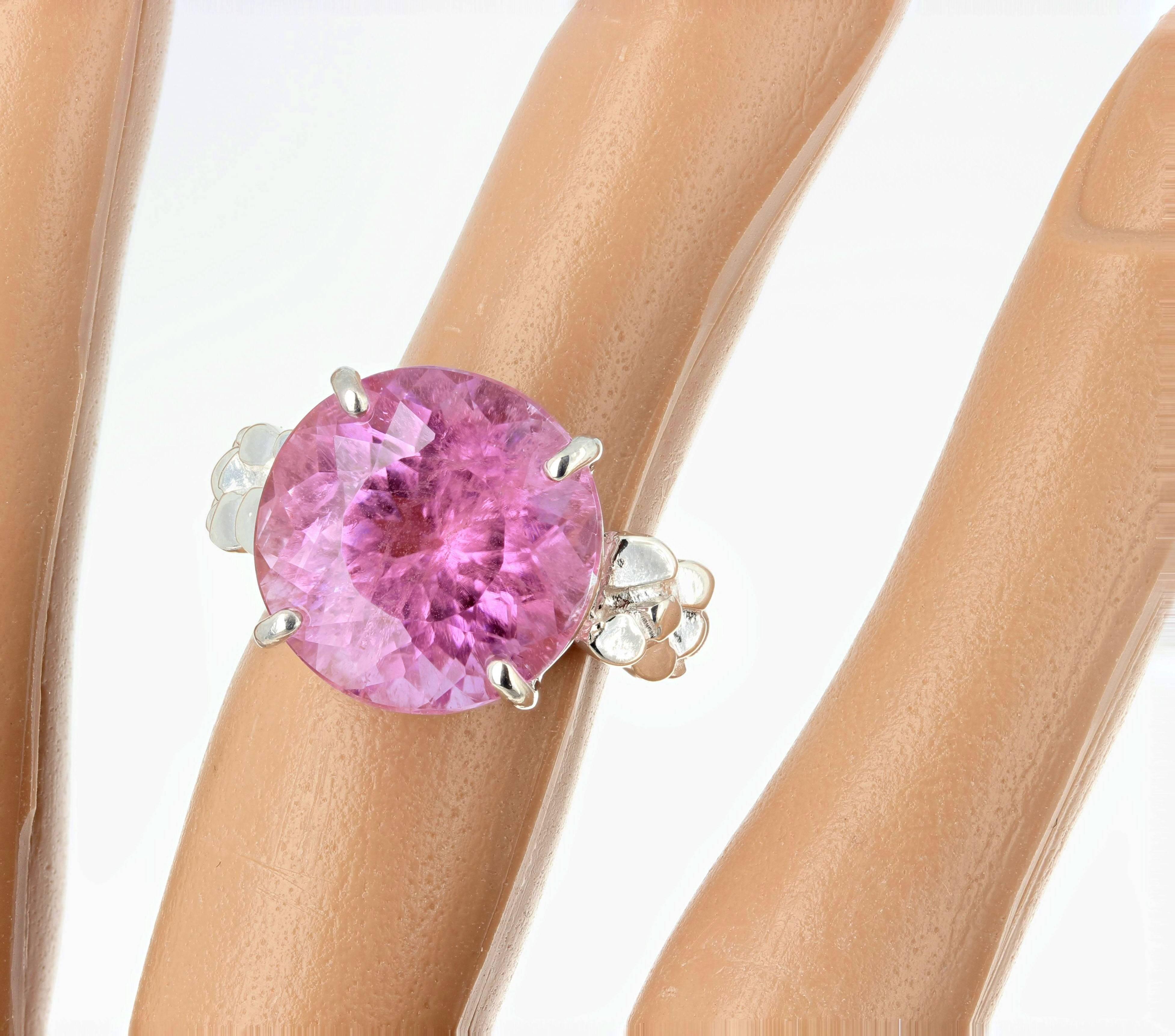 Unique Glittering brilliant pinky round 13.5 carat natural Kunzite (14.8 mm) set in a sterling silver handmade ring size 6 (sizable).  By looking at the photo on the finger/hand you can see that this is truly magnificent to wear to all special