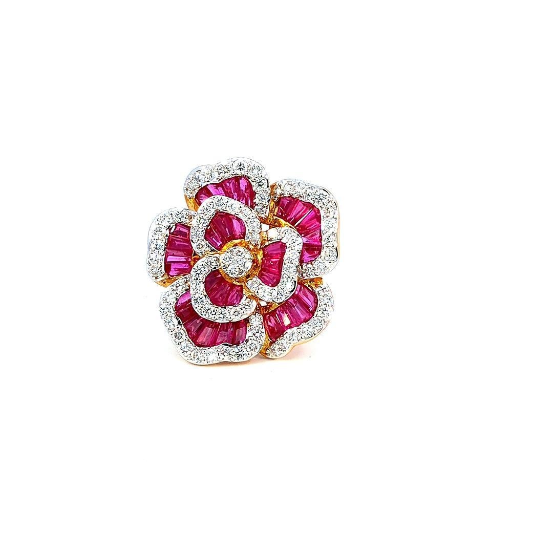 Step into a world of enchantment with our Ruby Illusion Ring, a spellbinding creation that seamlessly blends the fiery allure of 13.5 carats of rubies with the scintillating sparkle of 4.25 carats of diamonds. This ring is a mesmerizing symphony of