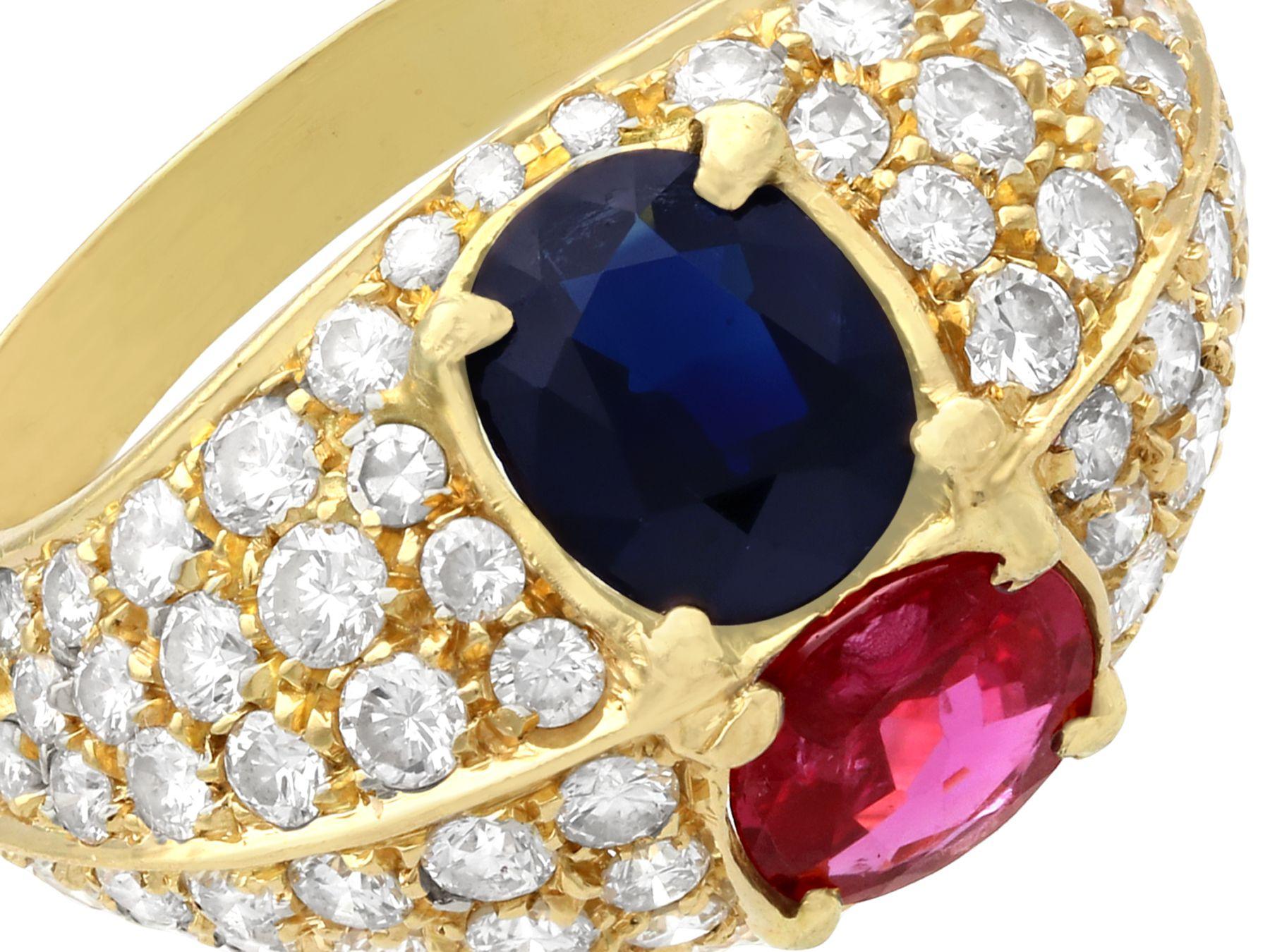 Contemporary 1.35 Carat Ruby and 1.28 Carat Sapphire 1.75 Carat Diamond and Yellow Gold Ring For Sale