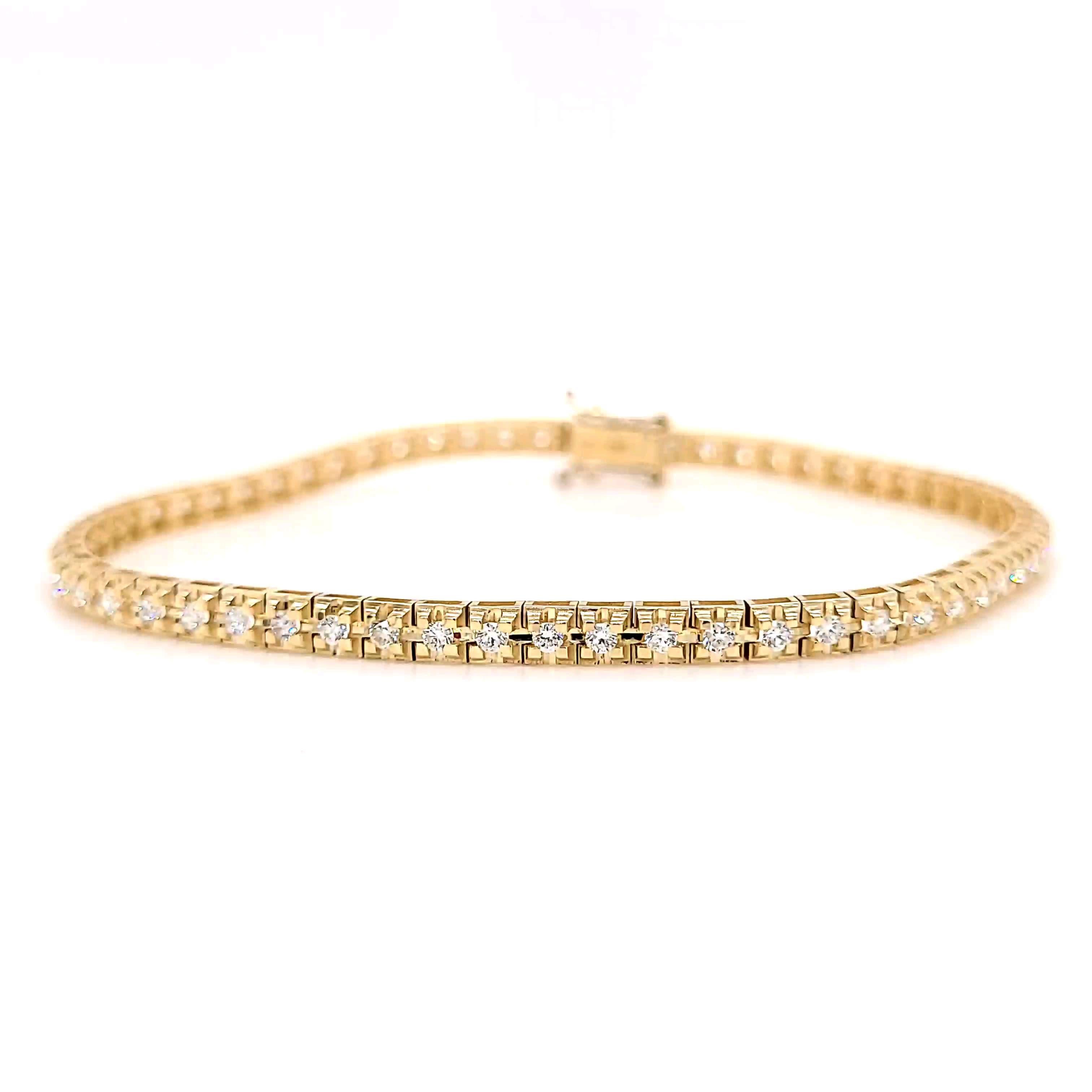 Behold this stunningly handcrafted Diamond Tennis Bracelet, a true masterpiece set with 61 exquisite round cut diamonds of the highest E-F / VVS quality, mounted on 14K white gold. With a total diamond weight of 1.35 carats, it sparkles with a