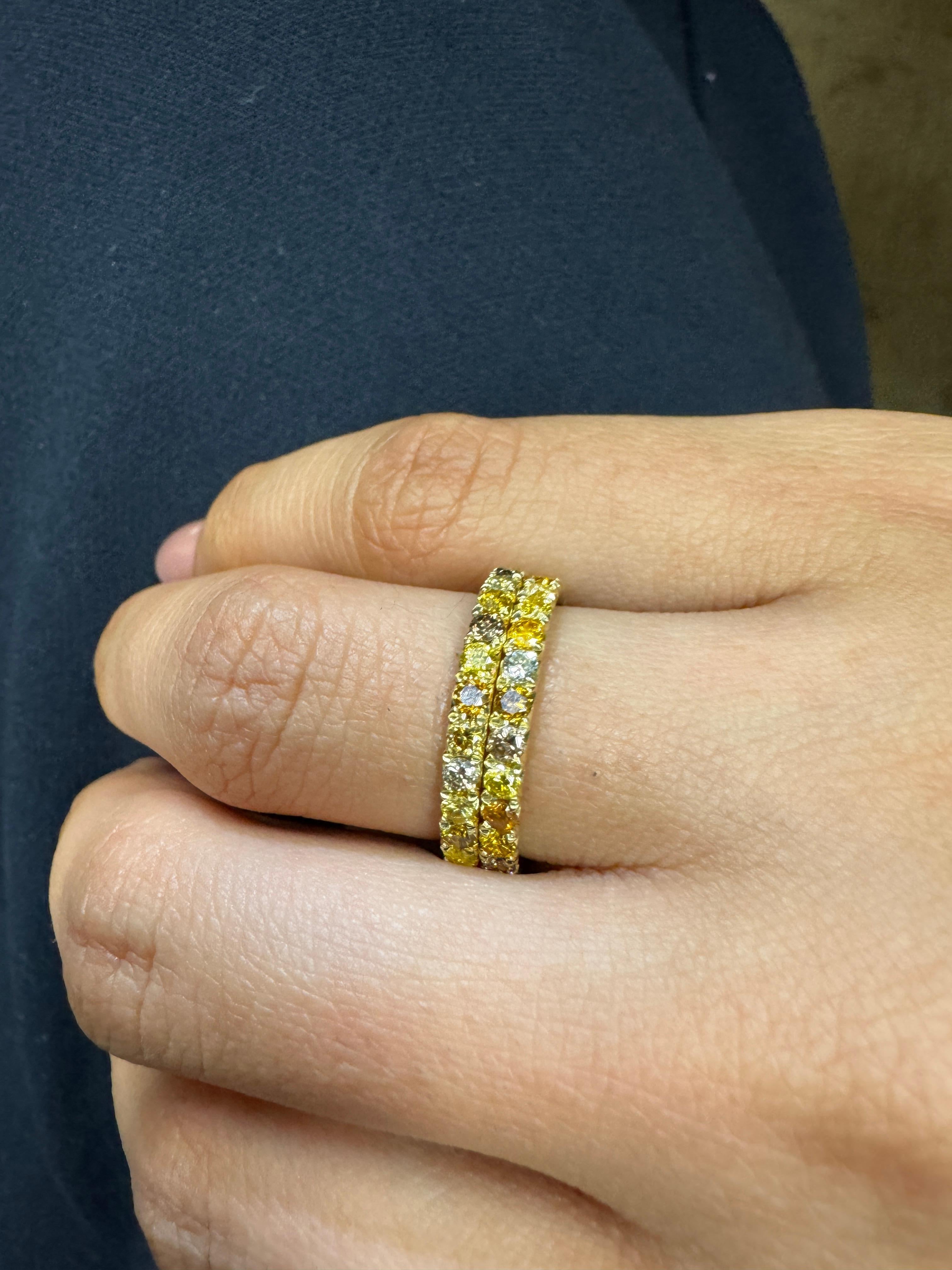 This unique diamond band features an assortment of 27 Fall colored micro-pave round diamonds, 2.25 mm each and 1.35 carats total weight set in French cut style 18K yellow gold band. Diamonds are 100% natural, no color treatment. Total ring weight is