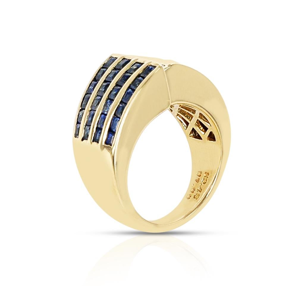 A Baguette and Round Diamonds with Square-Cut Sapphire Cocktail Ring made in 18 Karat Yellow Gold. The diamonds weigh 1.35 carats and the sapphires weigh 2.45 carats. The total weight of the ring is 15.80 grams. The ring size is US 7.

SKU: