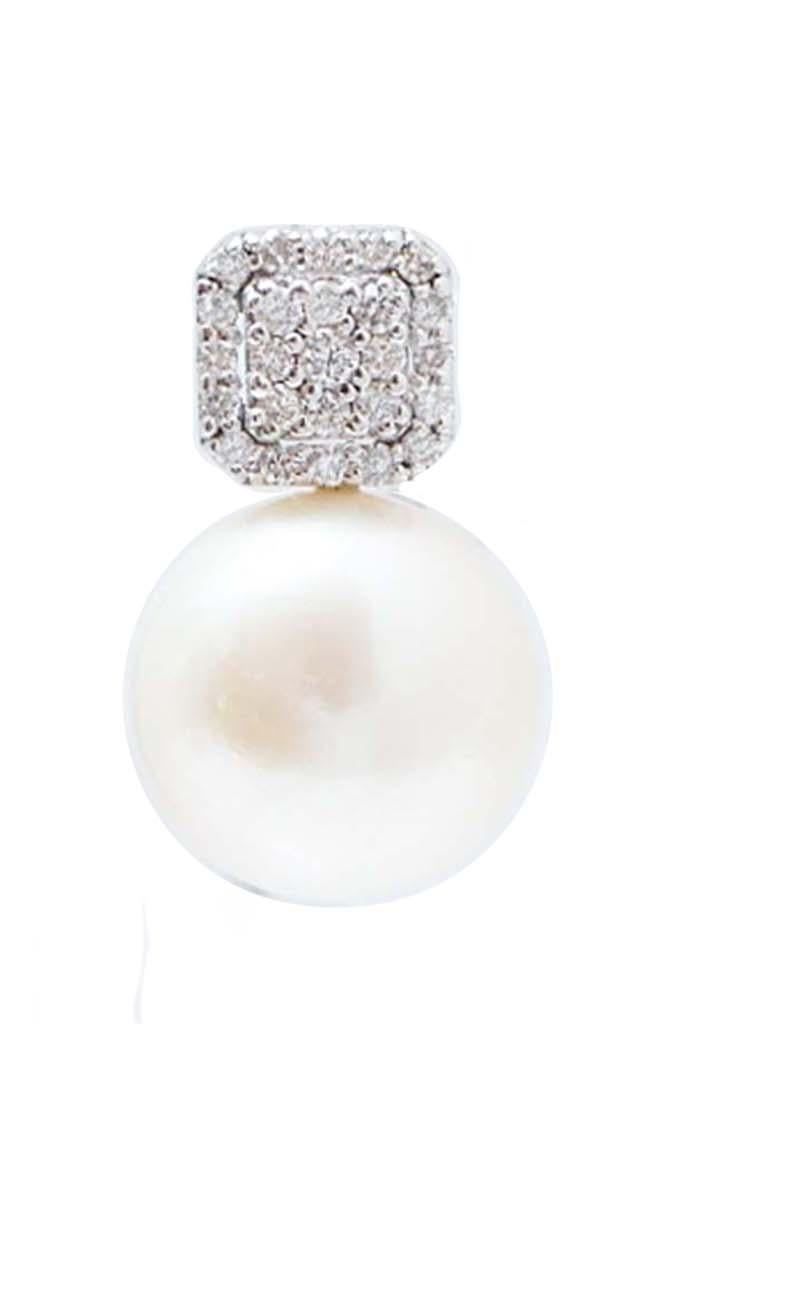 Eleganti orecchini in oro bianco 18 kt con struttura tempestata di diamanti e, in basso, una perla.
Diamanti 0.79 ct
Perle 6,60 gr 
Peso totale 9.50 gr
RF     G    UERA
RK.AHHO98

Per qualsiasi informazione, non esitare a contattare il venditore