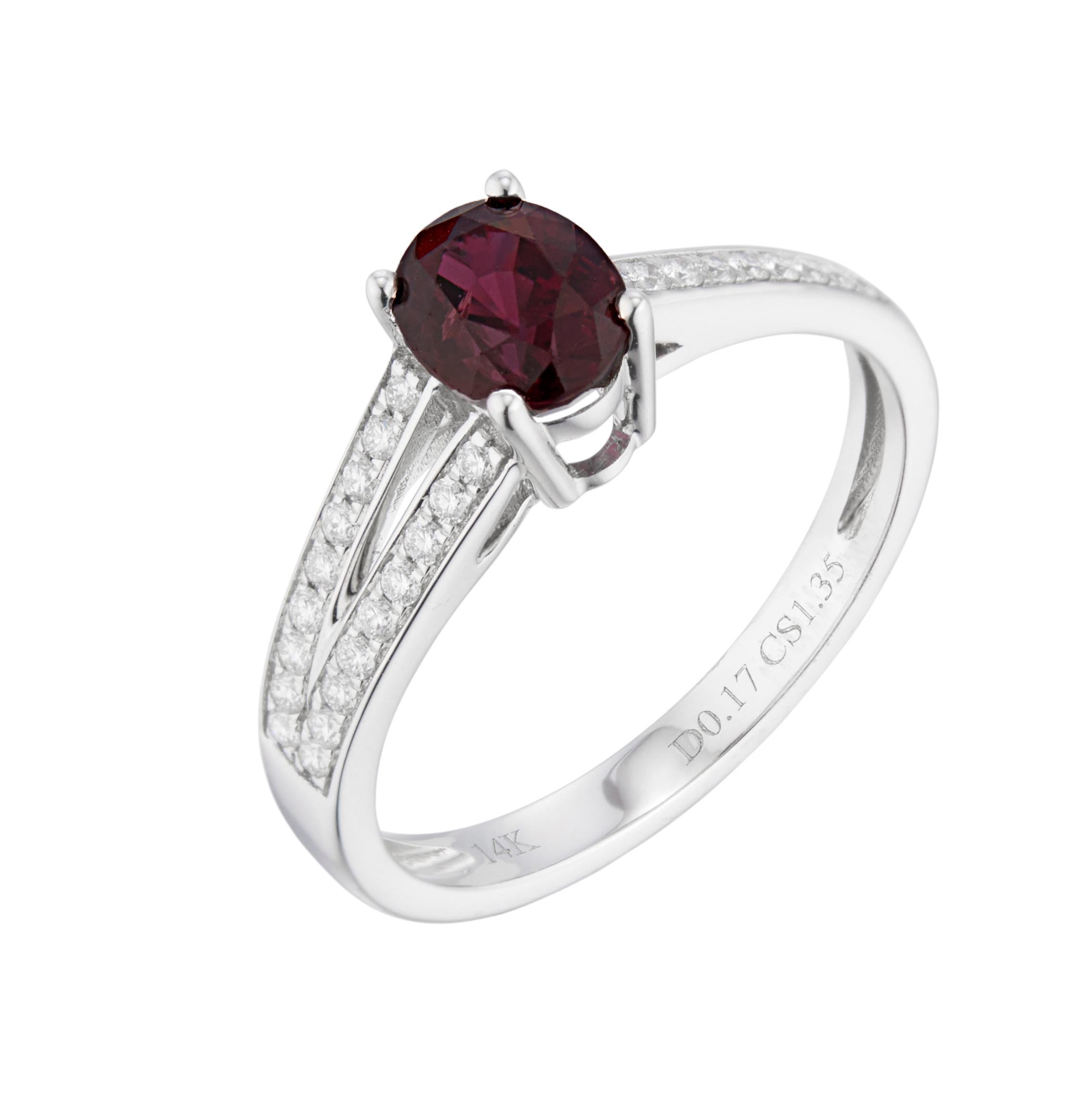 Ruby and diamond engagement ring. Oval ruby center stone set in 14k white gold semi- split shank setting with 27 round cut diamonds accent diamonds.

1 oval red ruby, approx. 1.35
27 diamonds, G VS-SI approx. .17cts
Size 7 and sizable 
14k white