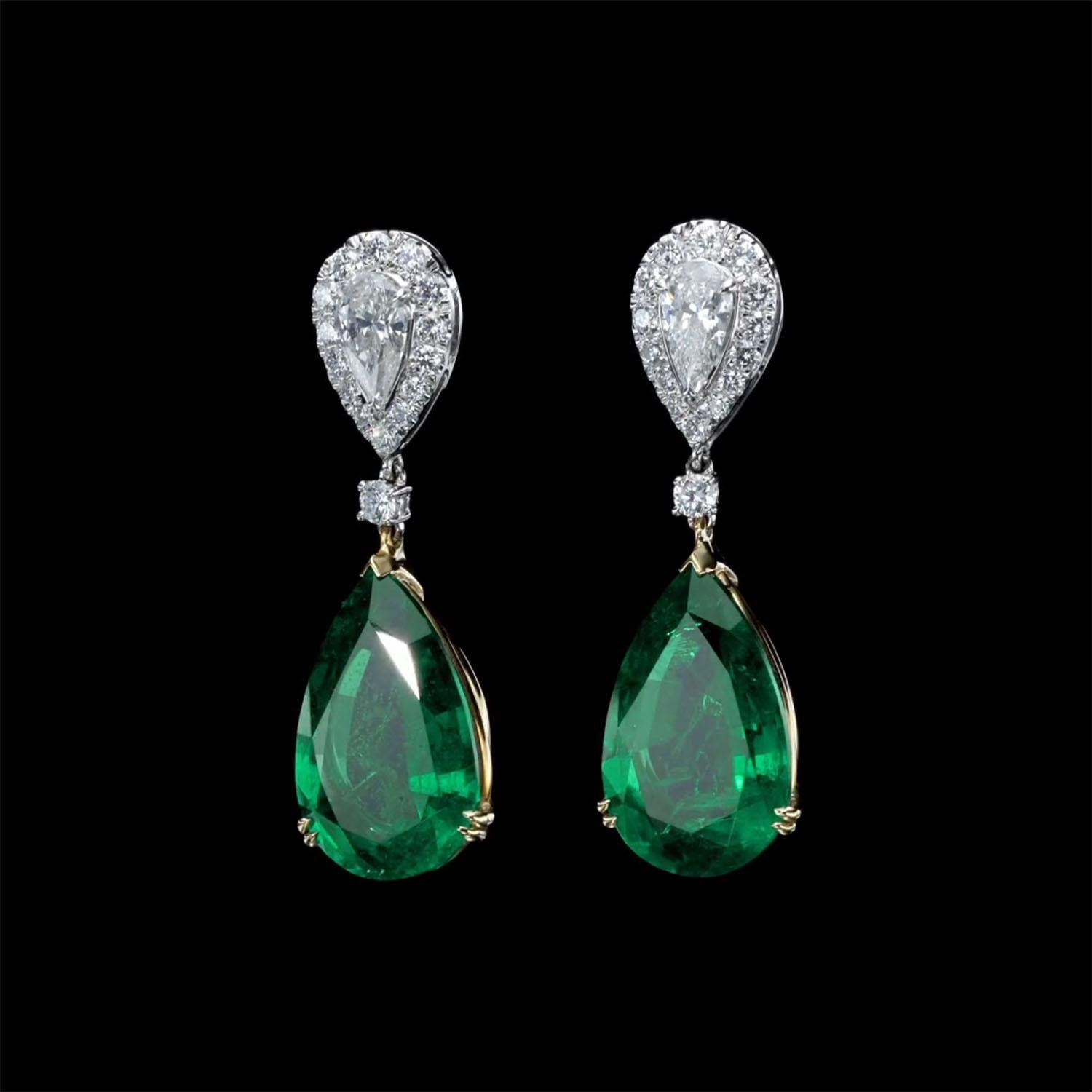 Introducing our exquisite Green Emerald and Diamond Earrings, a testament to exceptional craftsmanship and unparalleled beauty. These remarkable earrings feature a pair of pear-shaped diamonds, each weighing 0.49 carats, adorned with a scintillating