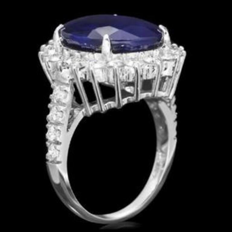 13.50 Carats Exquisite Natural Blue Sapphire and Diamond 14K Solid White Gold Ring

Total Blue Sapphire Weight is: Approx. 12.00 Carats

Sapphire Measures: Approx. 15.00 x 12.00mm

Sapphire Treatment: Diffusion

Natural Round Diamonds Weight:
