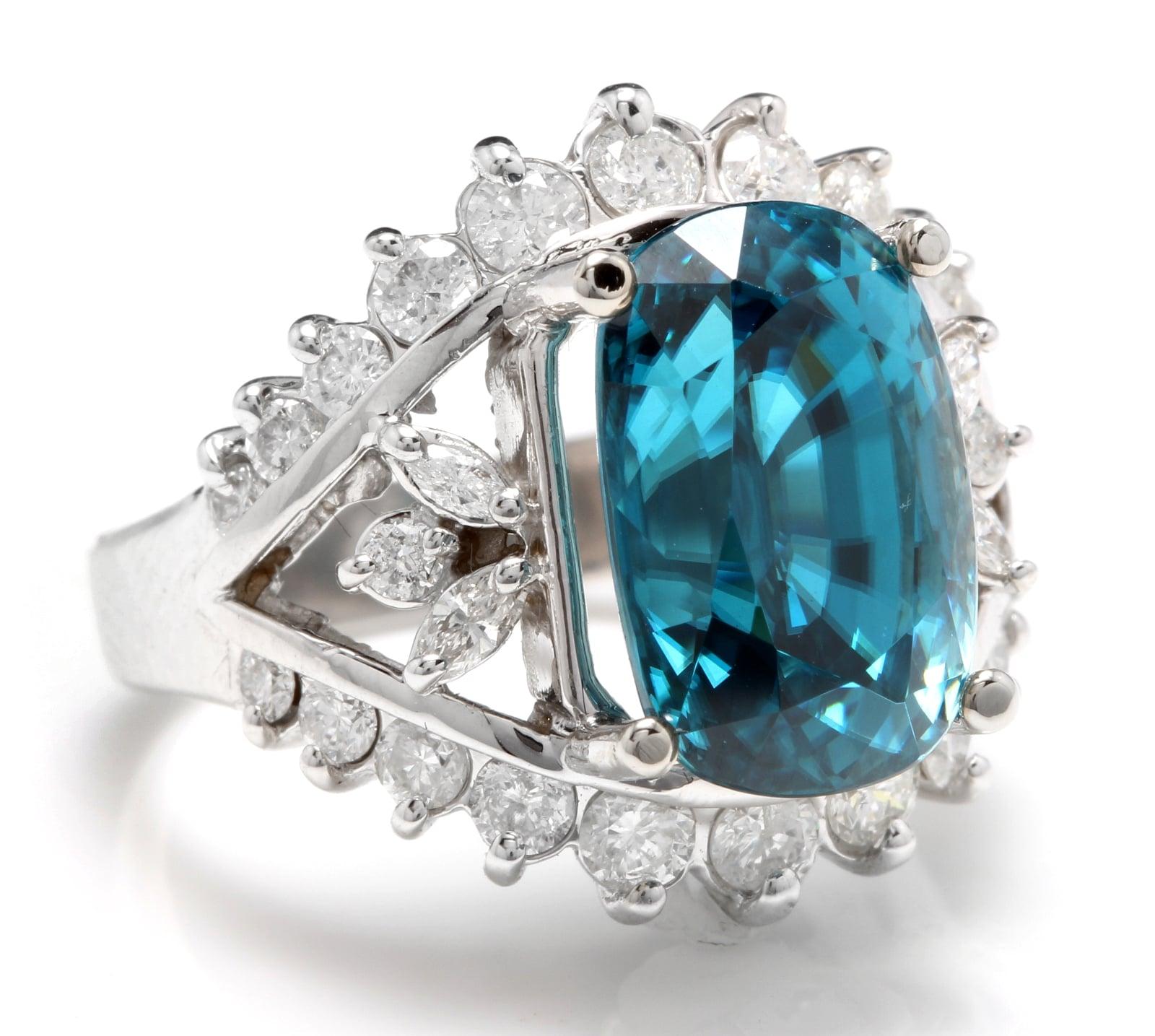 13.bague en or blanc massif 14K avec zircon et diamant d'un très bel aspect naturel de 50 carats

Valeur de remplacement suggérée : Environ 8 300 $

Le poids total du zircon naturel taille coussin est de : Environ 12.00 Carats 

Mesures du zircon :