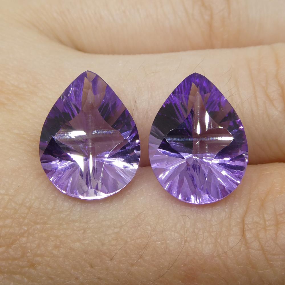 Description:

Gem Type: Amethyst
Number of Stones: 2
Weight: 13.5 cts
Measurements: 15.90x12x7.70 mm
Shape: Pear
Cutting Style: Fantasy Cut
Cutting Style Crown: Modified Brilliant
Cutting Style Pavilion: Mixed Cut
Transparency: Transparent
Clarity: