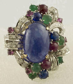 13.53 ct Tanzanite White Diamonds Rubies Sapphires Emeralds White Rose Gold Ring