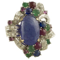 13.53 ct Tanzanite White Diamonds Rubies Sapphires Emeralds White Rose Gold Ring