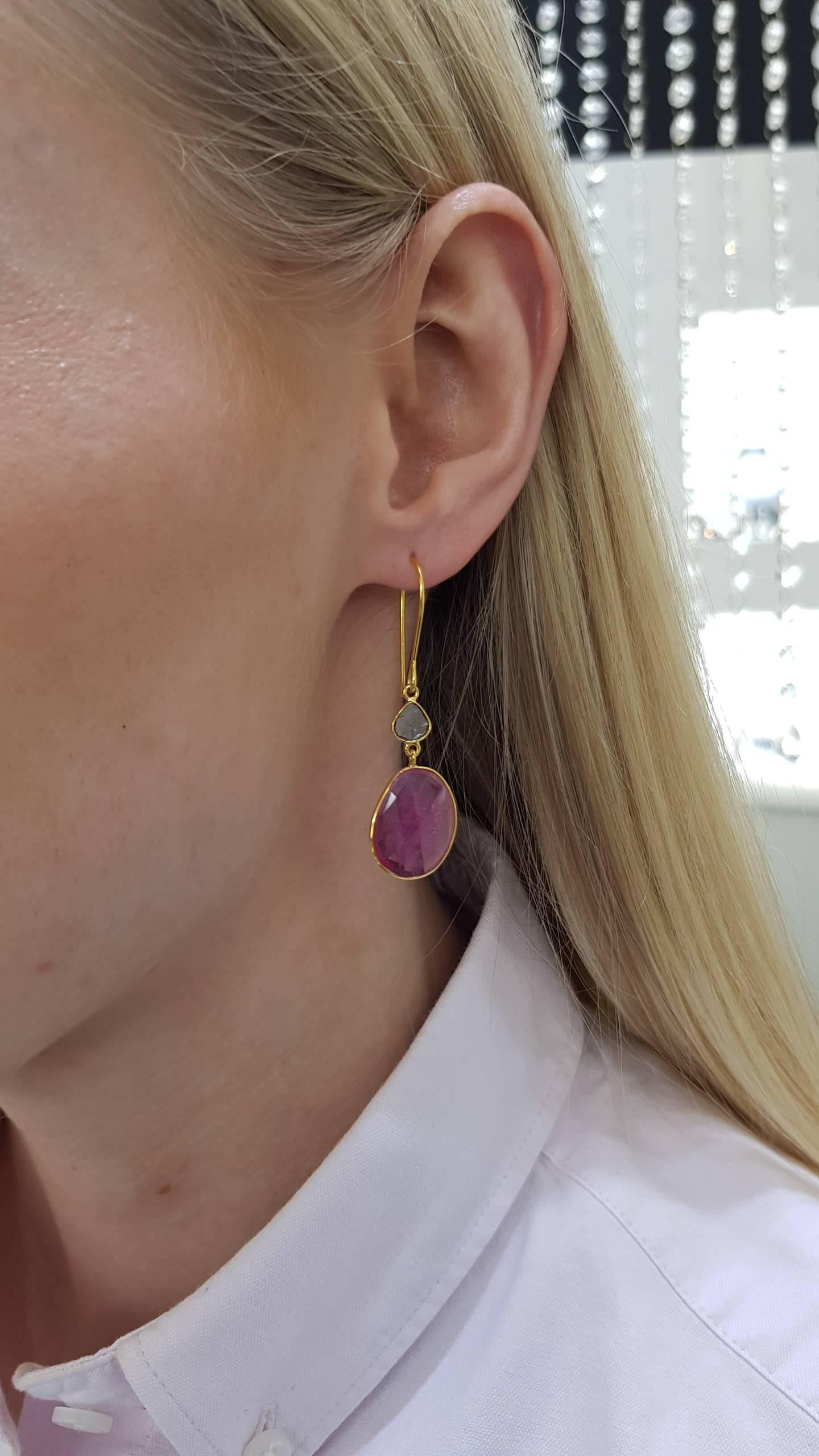 These Gorgeous 13.25 Carats Rose Cut Ruby Earrings feature 0.30 Carat in two Diamond slices set in 18 Karat Yellow Gold. Each piece is hand made with a unique shaped precious stones. These elegant and lightweight earrings are perfect for everyday