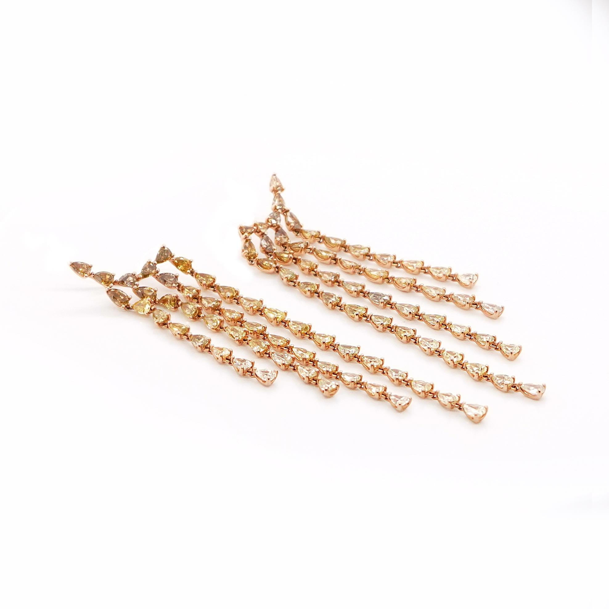 Pear Cut 13.59 carats Fancy Yellow Diamond Cuff Earrings, karats by Juhi diamond Earrings For Sale