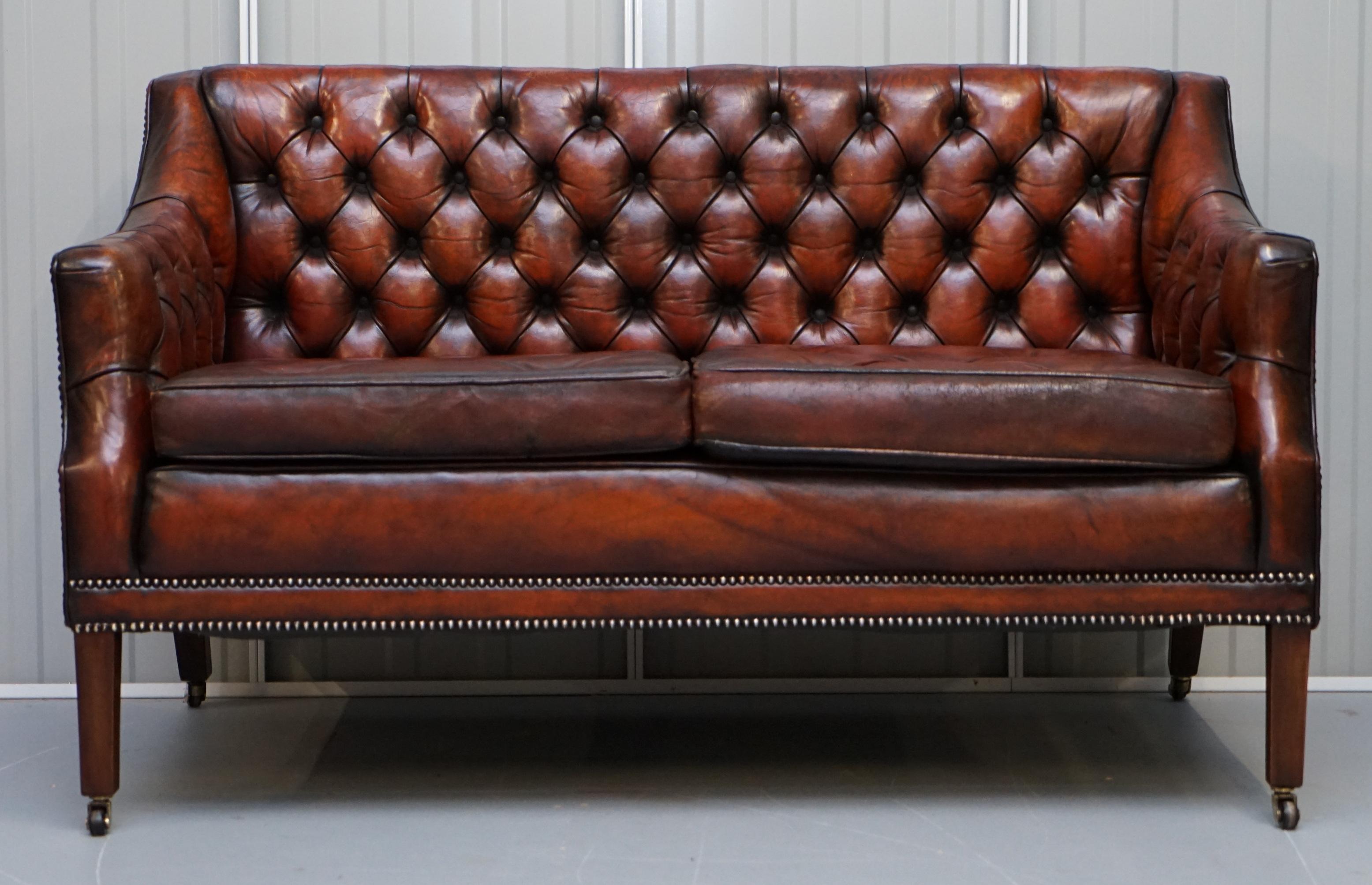 We are delighted to offer for sale this very rare fully restored Whisky brown leather Lutyen’s Viceroy style two seat brown leather sofa with Thomas Chippendale style floating button cushions 

A very good looking and rare sofa, the style comes