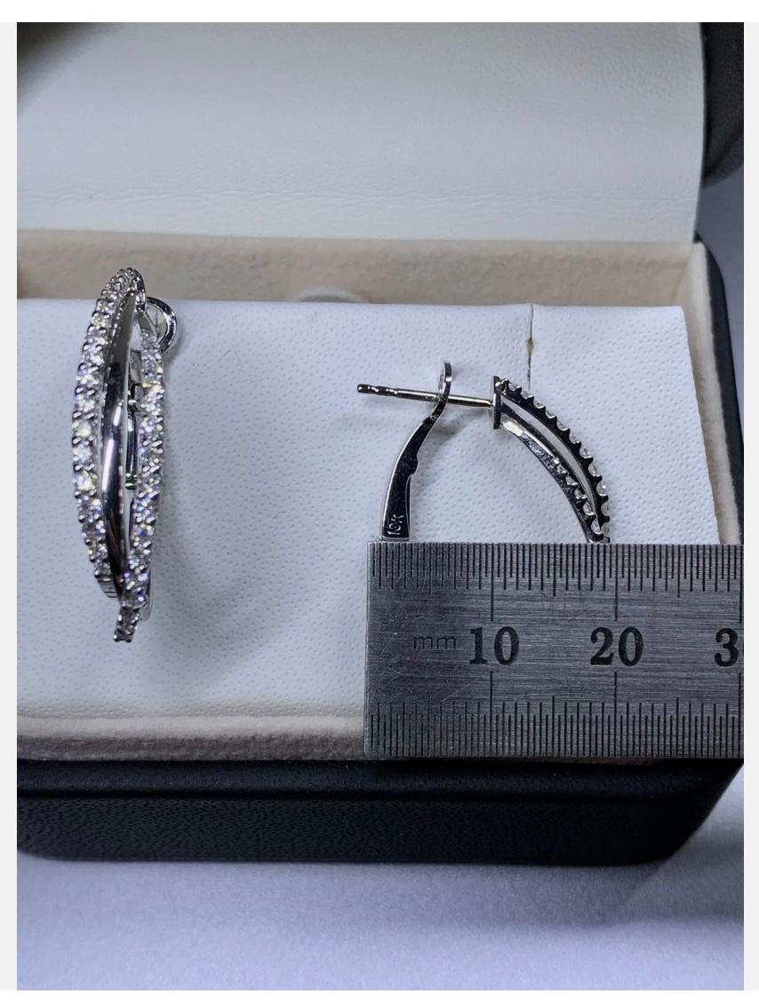 1.35ct Diamond Chunky Hoops Tennis Earrings 18ct White Gold
These diamond hoops earrings are a must-have for any jewellery collection. With a total carat weight of 1.35ct and a brilliant cut main stone shape, these earrings are sure to catch the