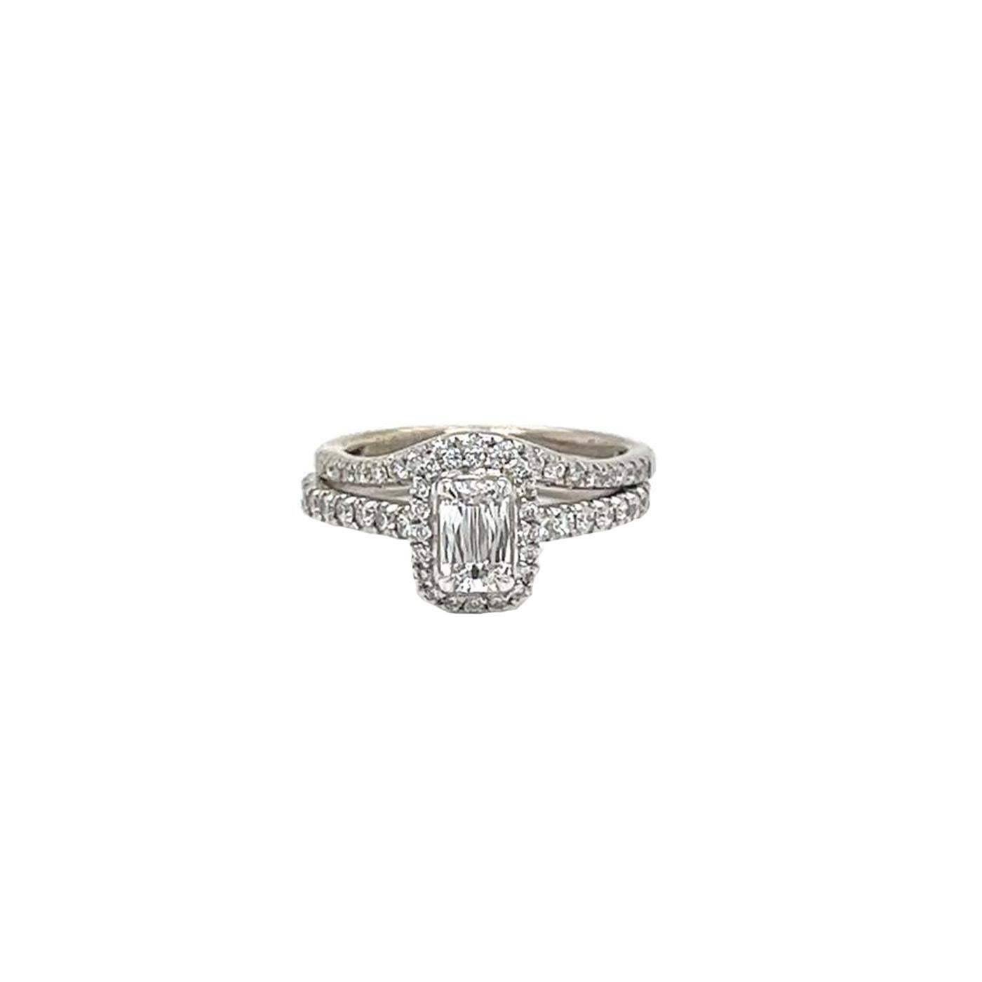 Beautiful emerald-cut diamond ring, centered on a 0.95 Carats Emerald-cut diamond of E color and VS1 clarity, Set in platinum with 0.45ct pave diamonds of D color and VS1 clarity, The Sparkling adds a touch to the piece, giving it a unique and