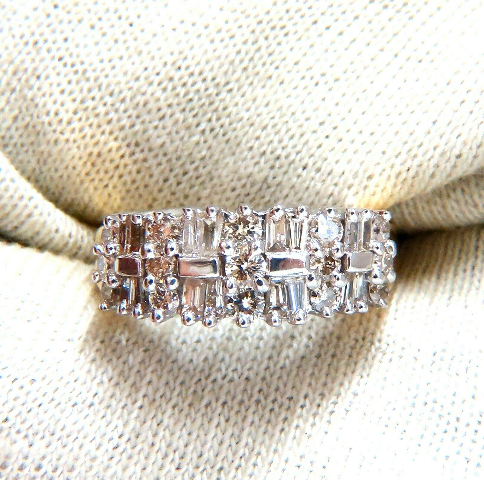 Cluster Row Baguette & Rounds Band.

1.35ct. Natural brilliant diamonds

Durable Built.

Si-2 clarity J color.

14kt yellow gold.

5.8 Grams

Overall ring: 7.8mm wide

Depth: 6.2mm

Current ring size: 7

Appraisal to accompany $3500

May