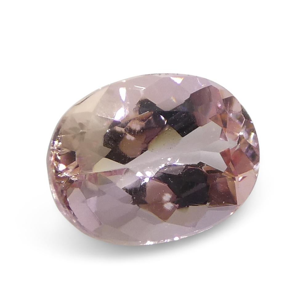 1.35 Carat Oval Orangy Pink Topaz GIA Certified For Sale 4