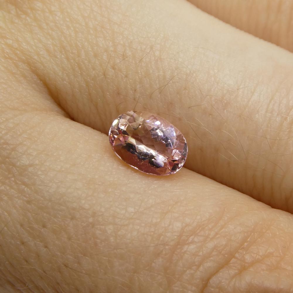 1.35 Carat Oval Orangy Pink Topaz GIA Certified For Sale 6