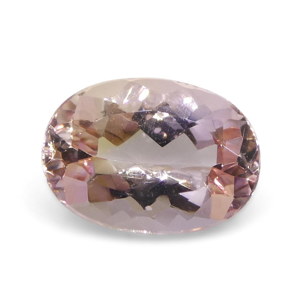1.35 Carat Oval Orangy Pink Topaz GIA Certified For Sale 7