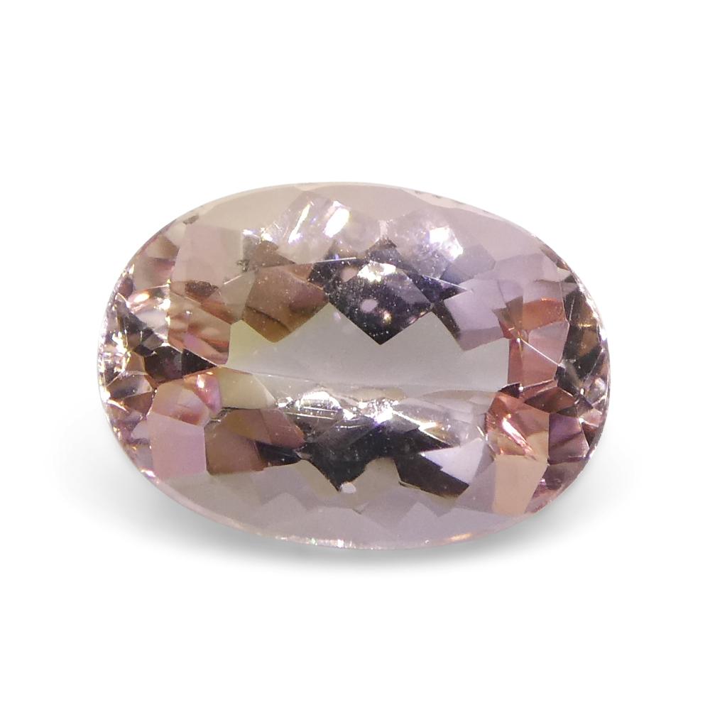 1.35ct Oval Orangy Pink Imperial Topaz GIA Certified 7